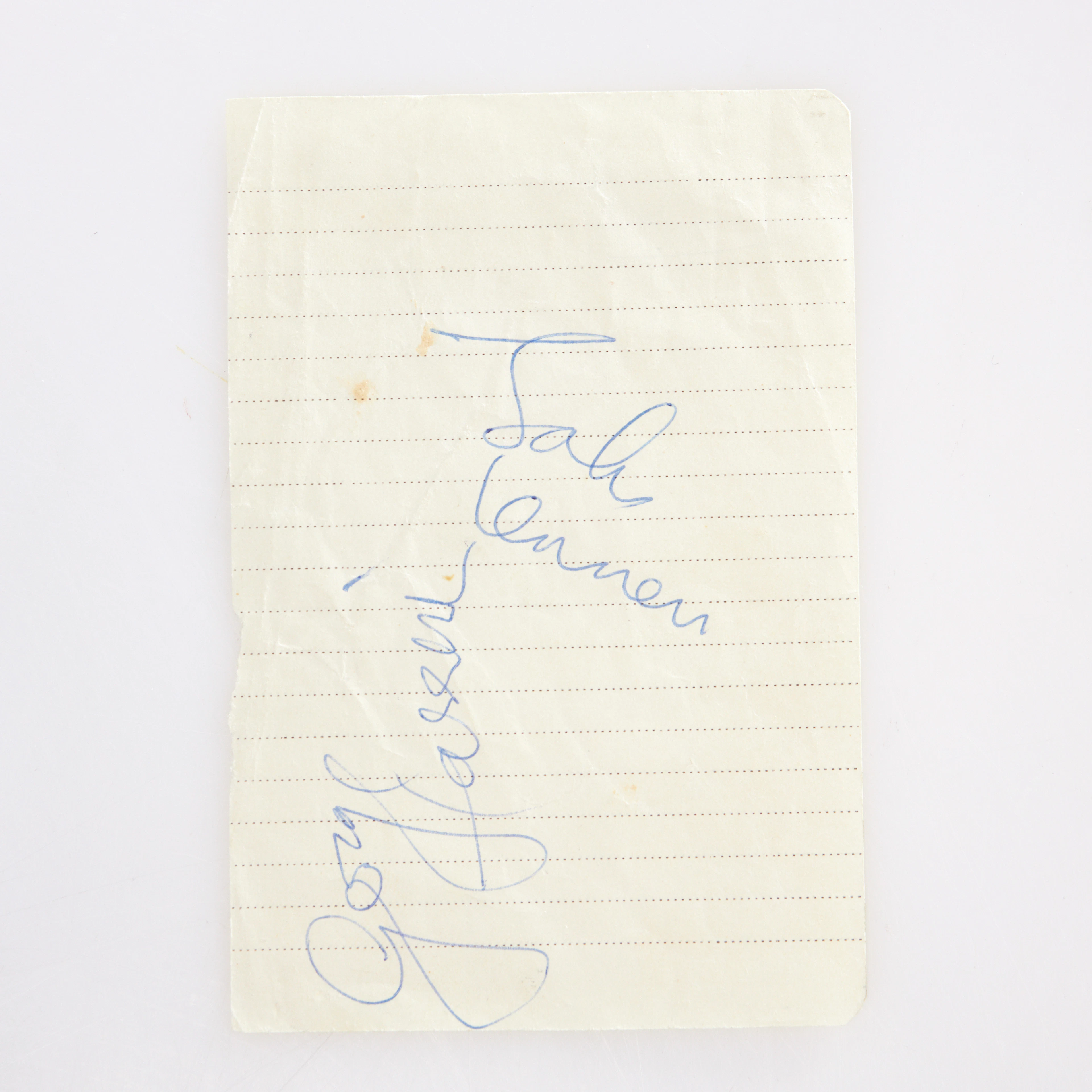 JOHN LENNON & GEORGE HARRISON. Signaturer, 1965, i bläck på linjerat papper.