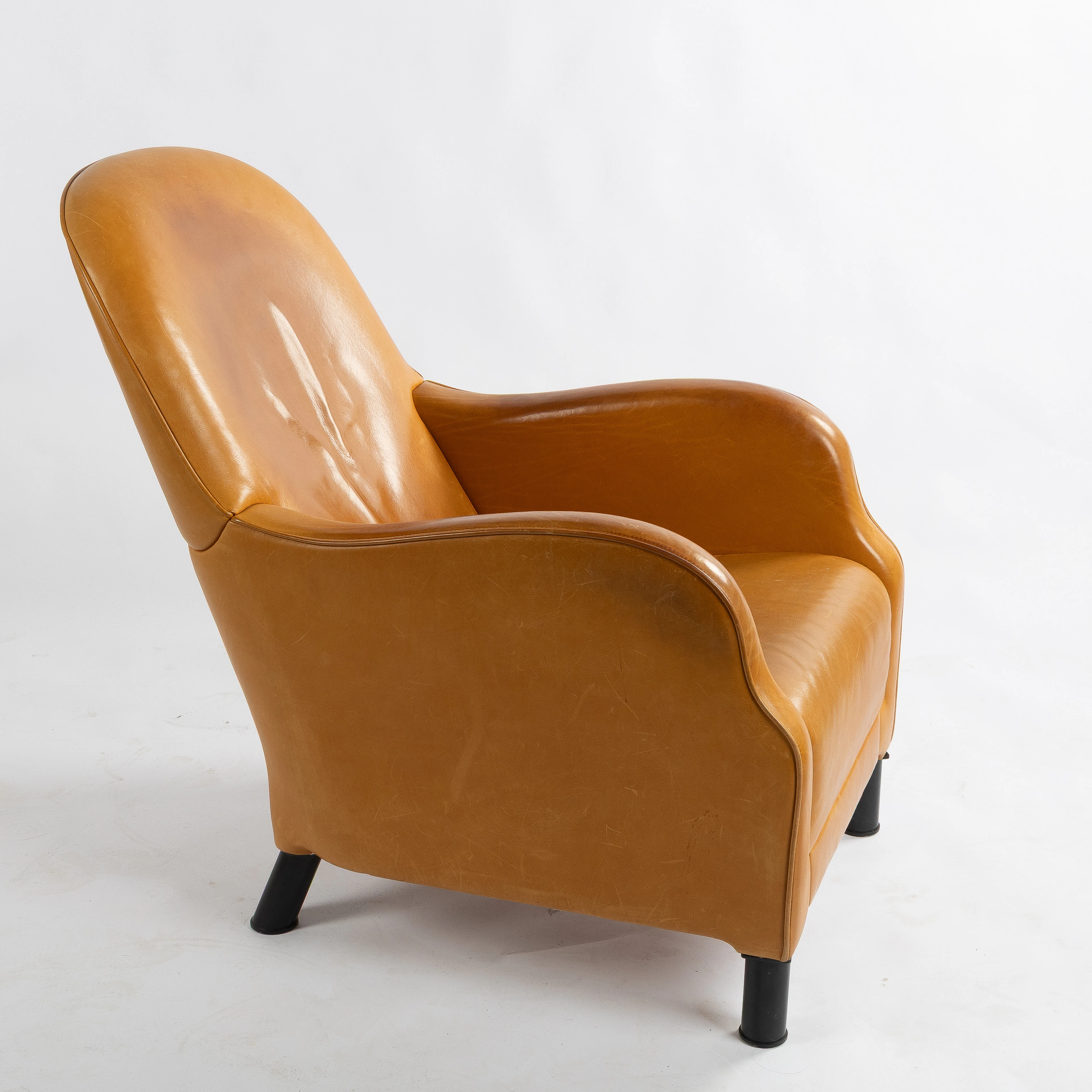 MATS THESELIUS. Fåtölj, "Pomme", Brühl & Sippold, 1997, cognacsfärgat