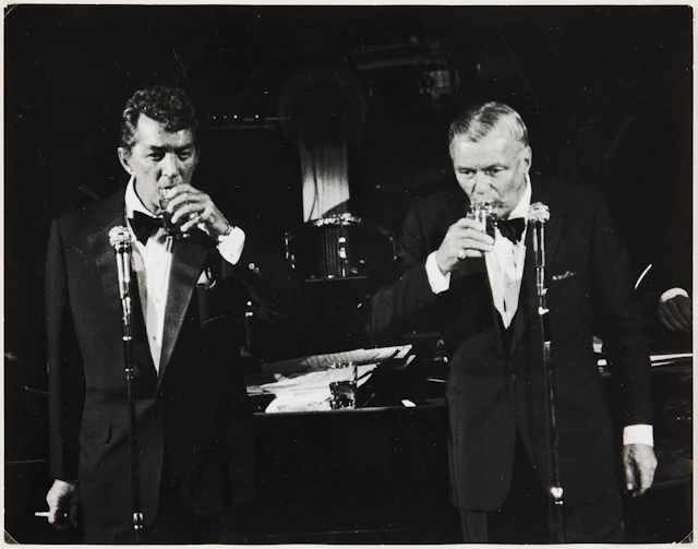 RON GALELLA. Frank Sinatra and Dean Martin, 1983.