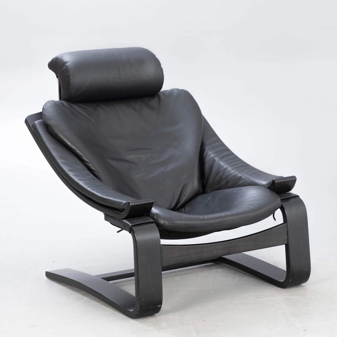 ÅKE FRIBYTER. Sessel 'Kroken', schwarzes Leder, Roche Bobois.