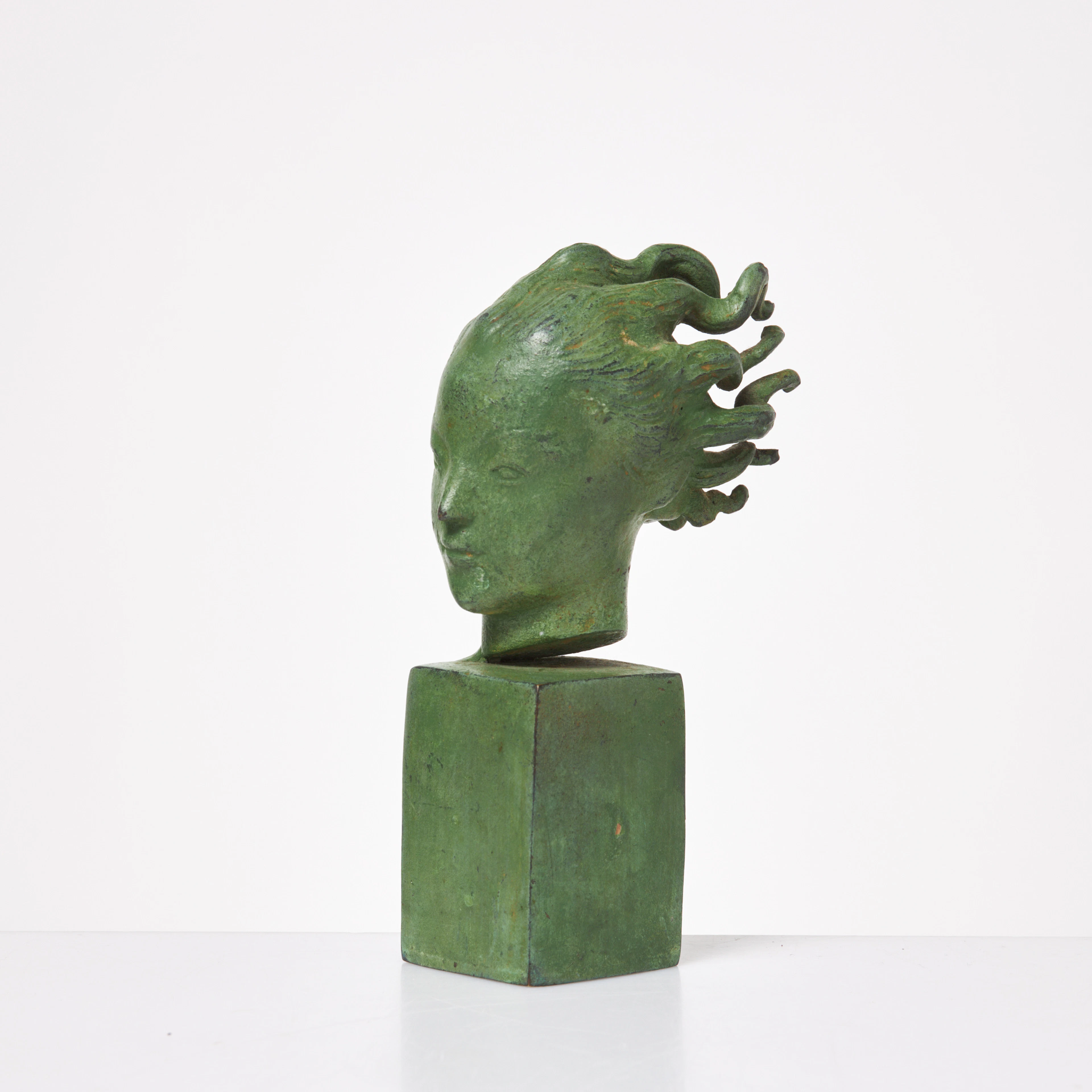 CARL MILLES. EFTER. Änglahuvud, skulptur, grönpatinerad brons, museikopia