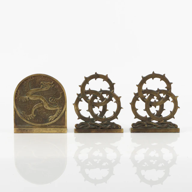 BOKSTÖD, 3 stycken, brons, 1920/30-tal.