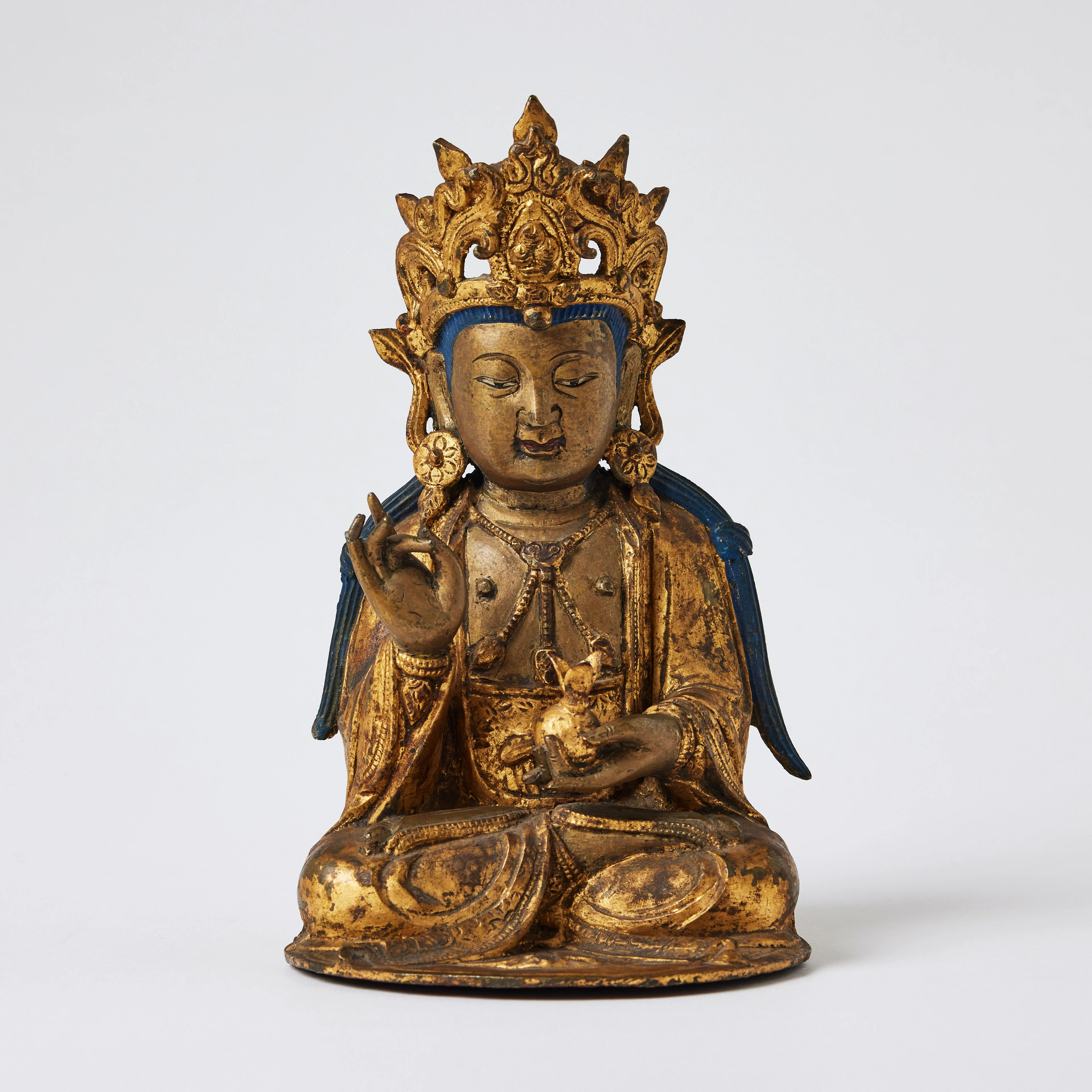A Chinese Gold-Lacquered Bronze Figure of Guanyin.