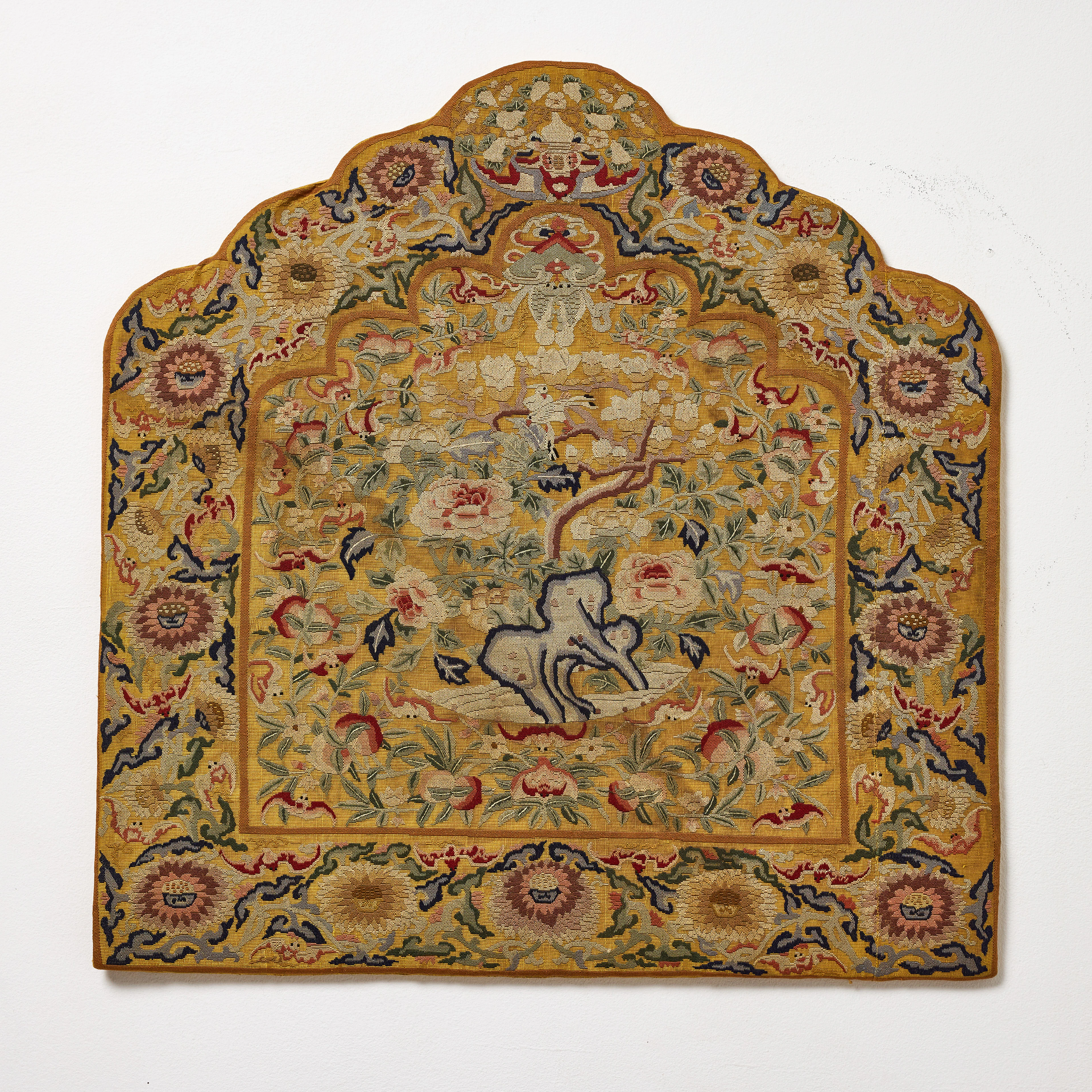 A Chinese Yellow-Ground Silk Cushion Cover.
