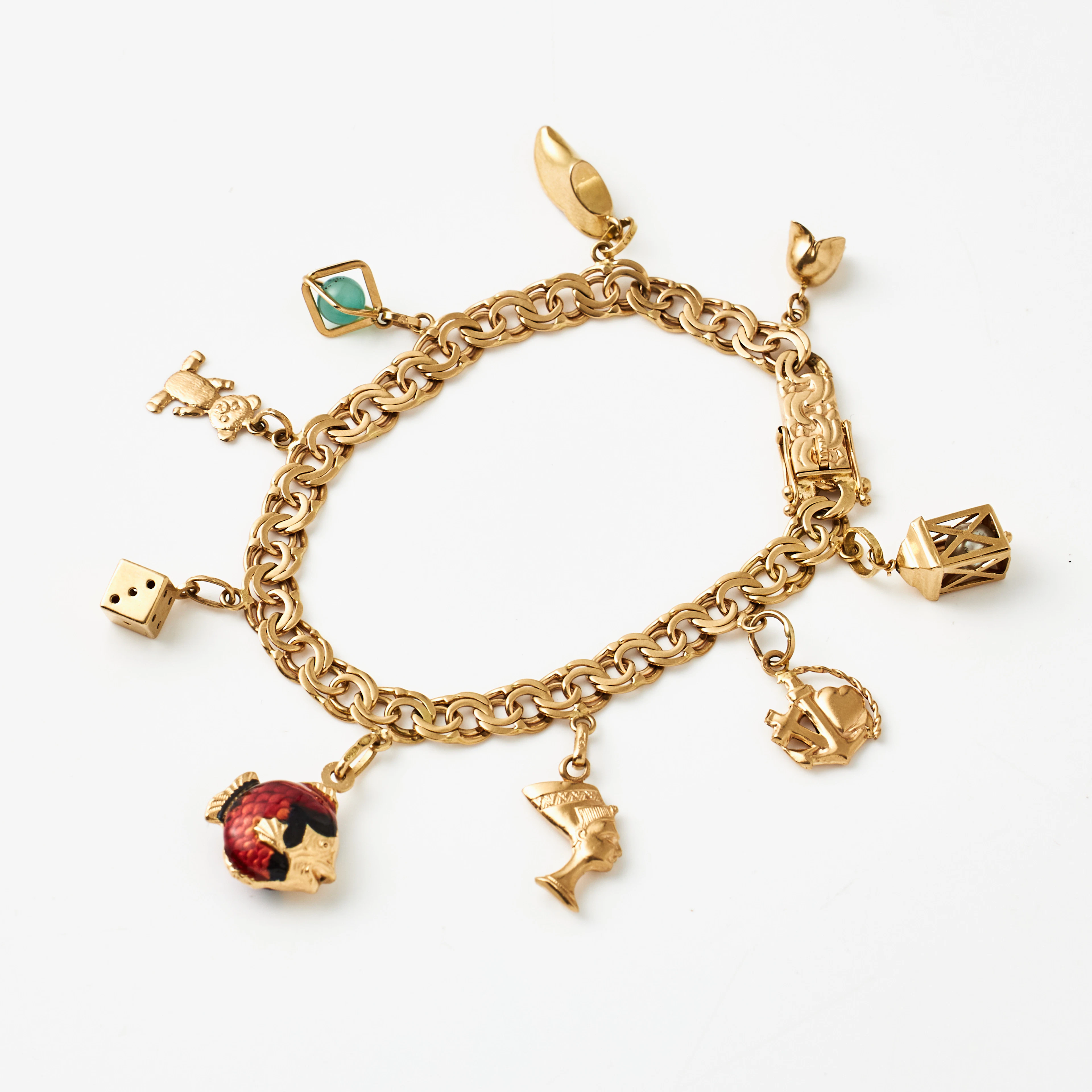 ARMBAND, 18 k guld, Bismarck, med berlocker bl a föreställande fisk