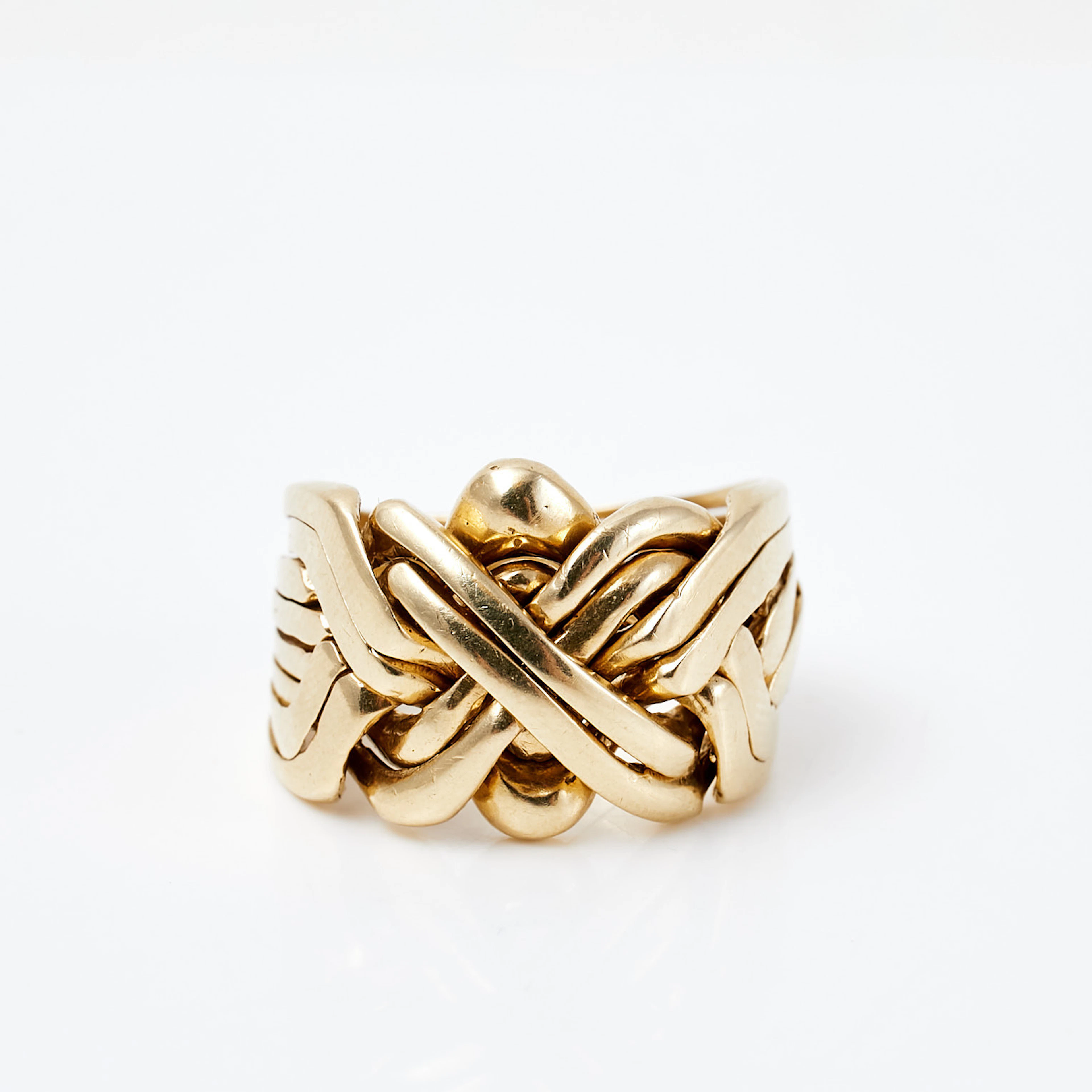 RING, 14 k guld, flätad pusselring, utländska stämplar.
