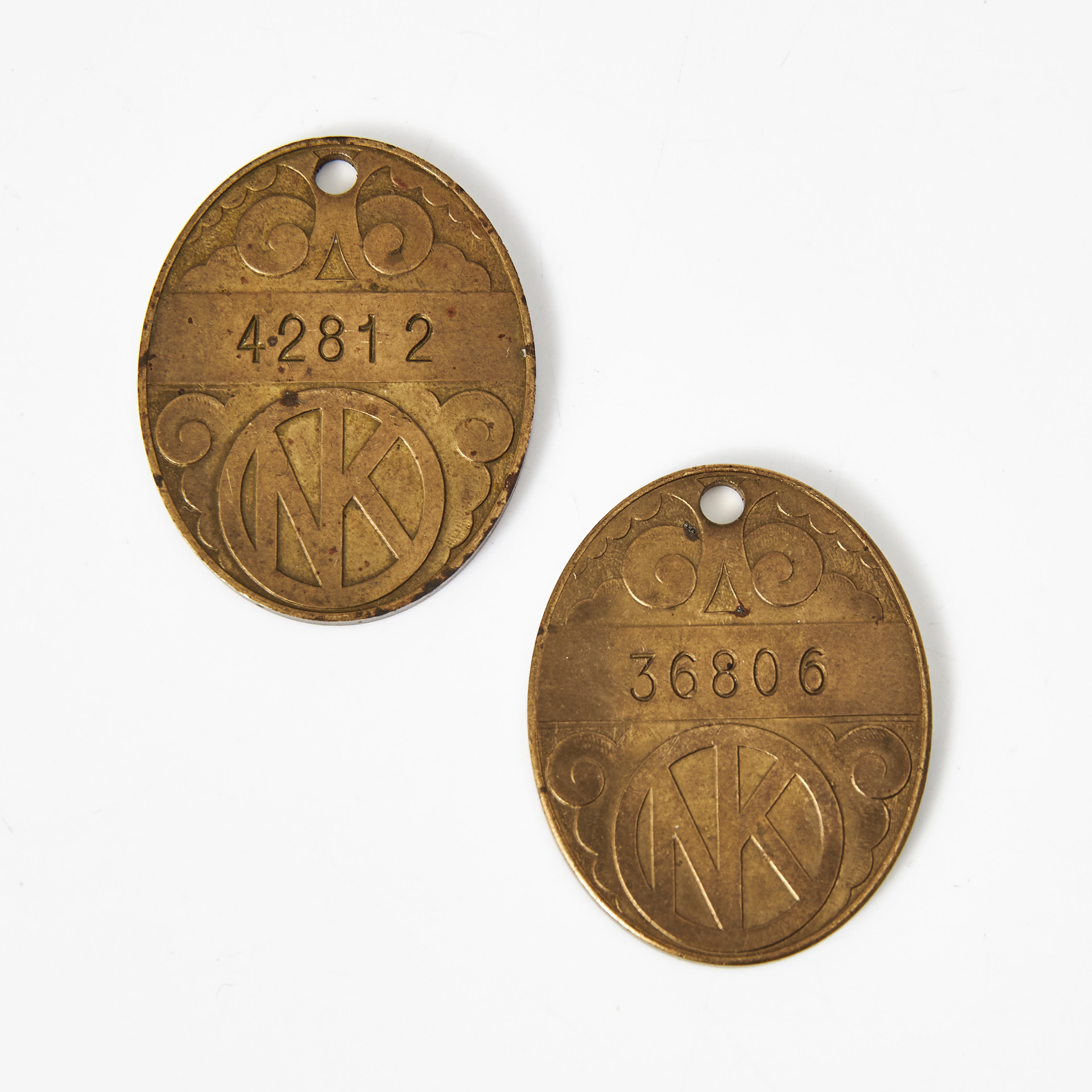 KREDITBRICKOR, 2 st., Sveriges första kredikort, brons, numrerad 42812