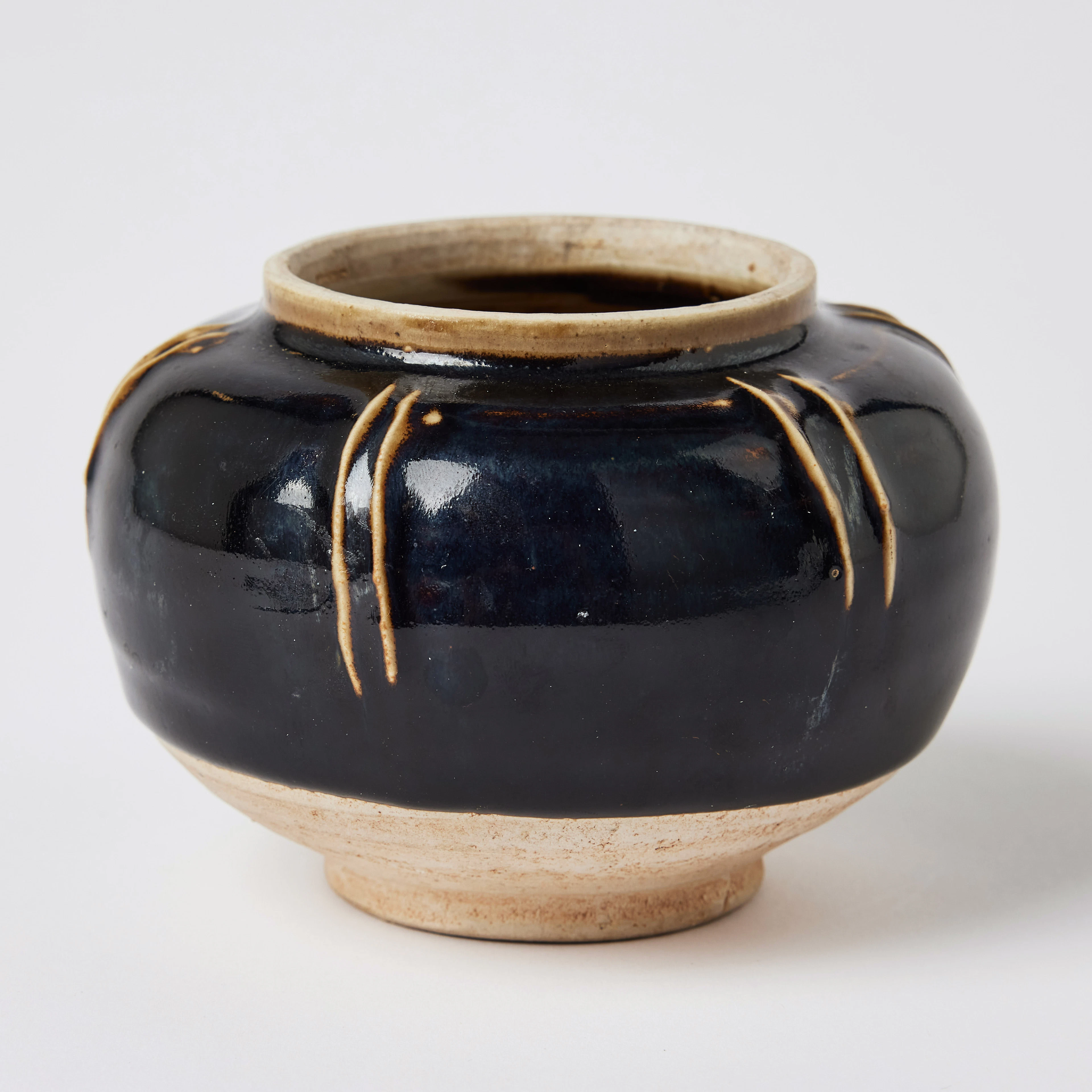 A Chinese Cizhou-Type Stoneware Ribbed Jar.
