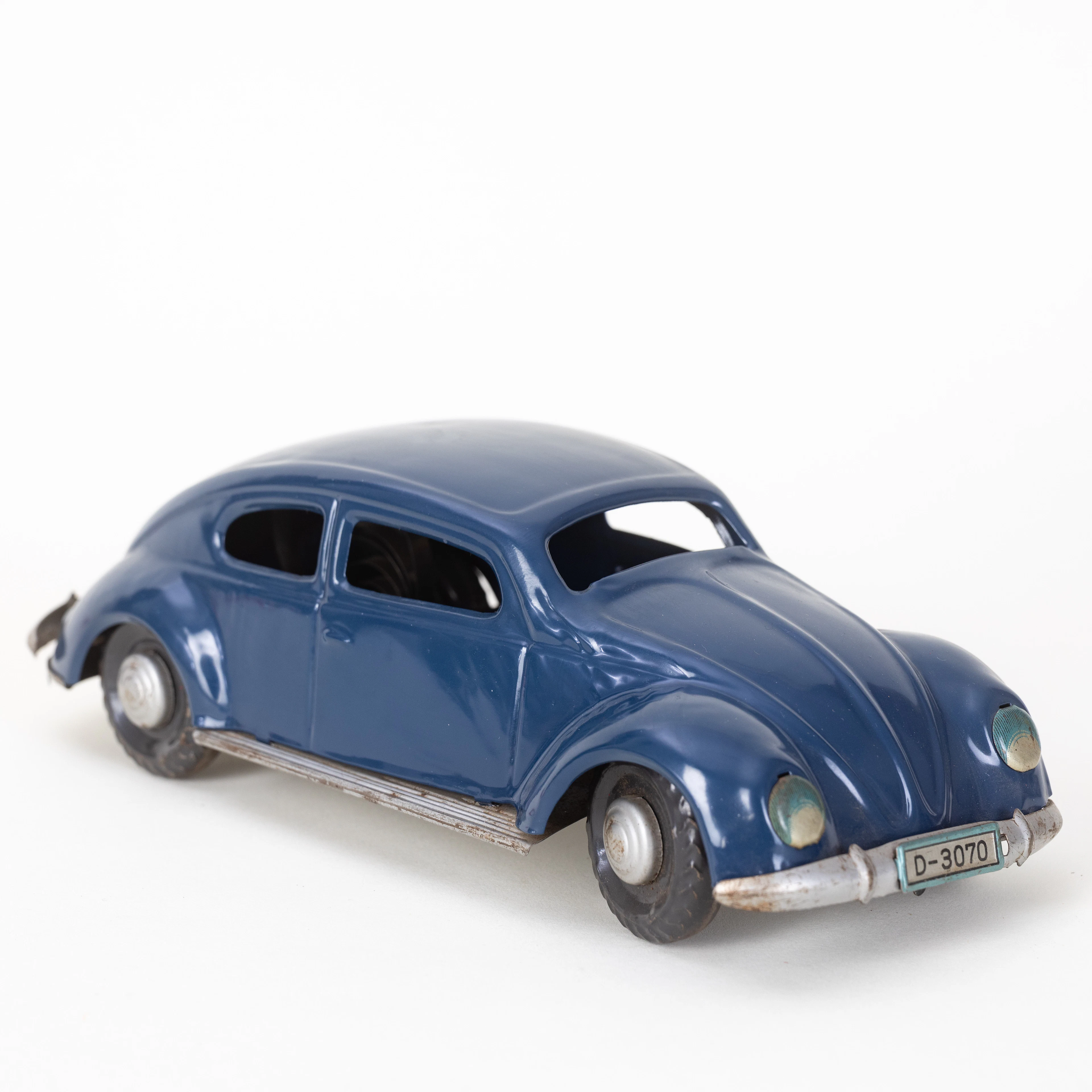 DISTLER. VW D-3070, Blechauto mit Uhrwerk, Westdeutschland, um 1950.