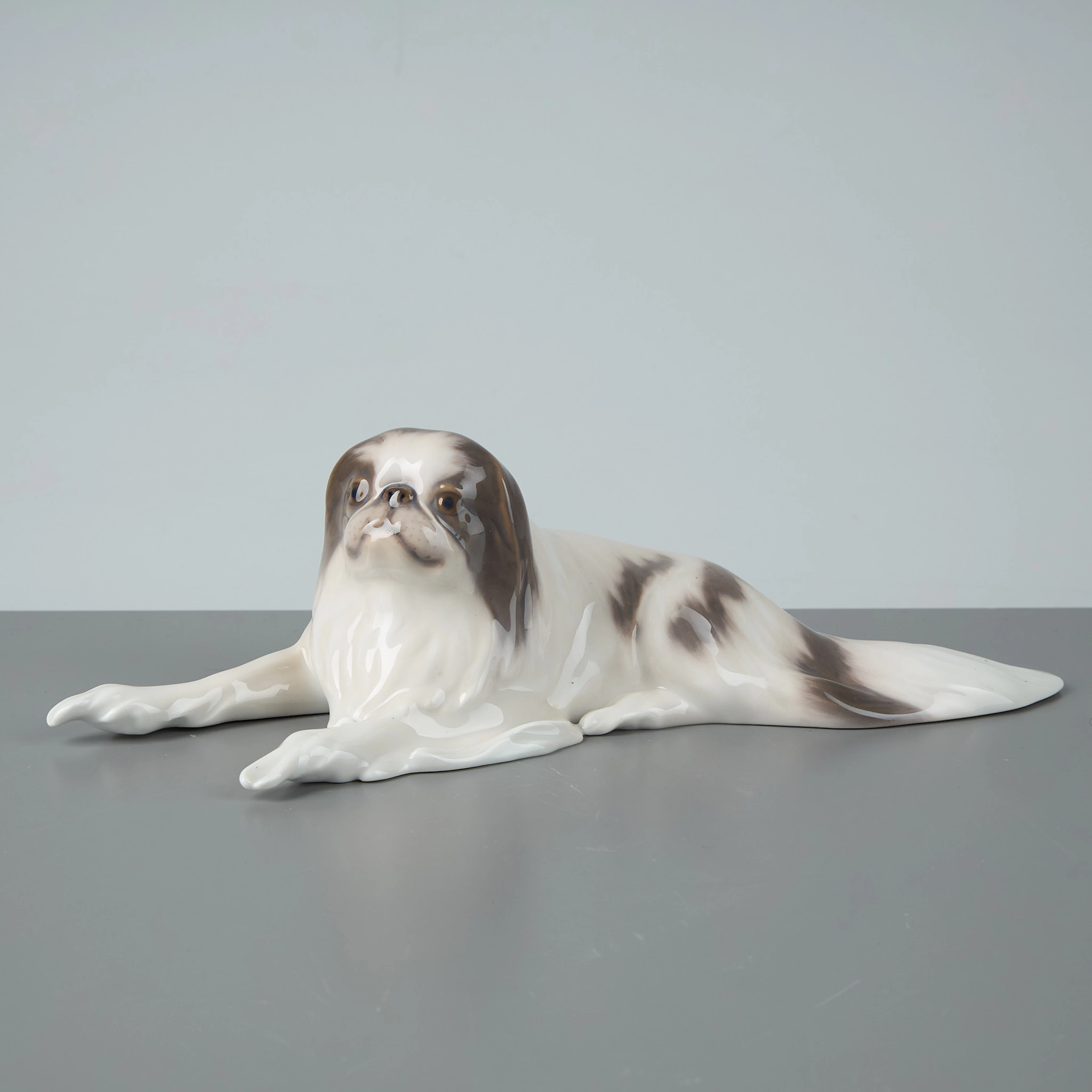 FIGURIN. Japansk spaniel. Märkt 1452/1662. Royal Copenhagen. Danmark.