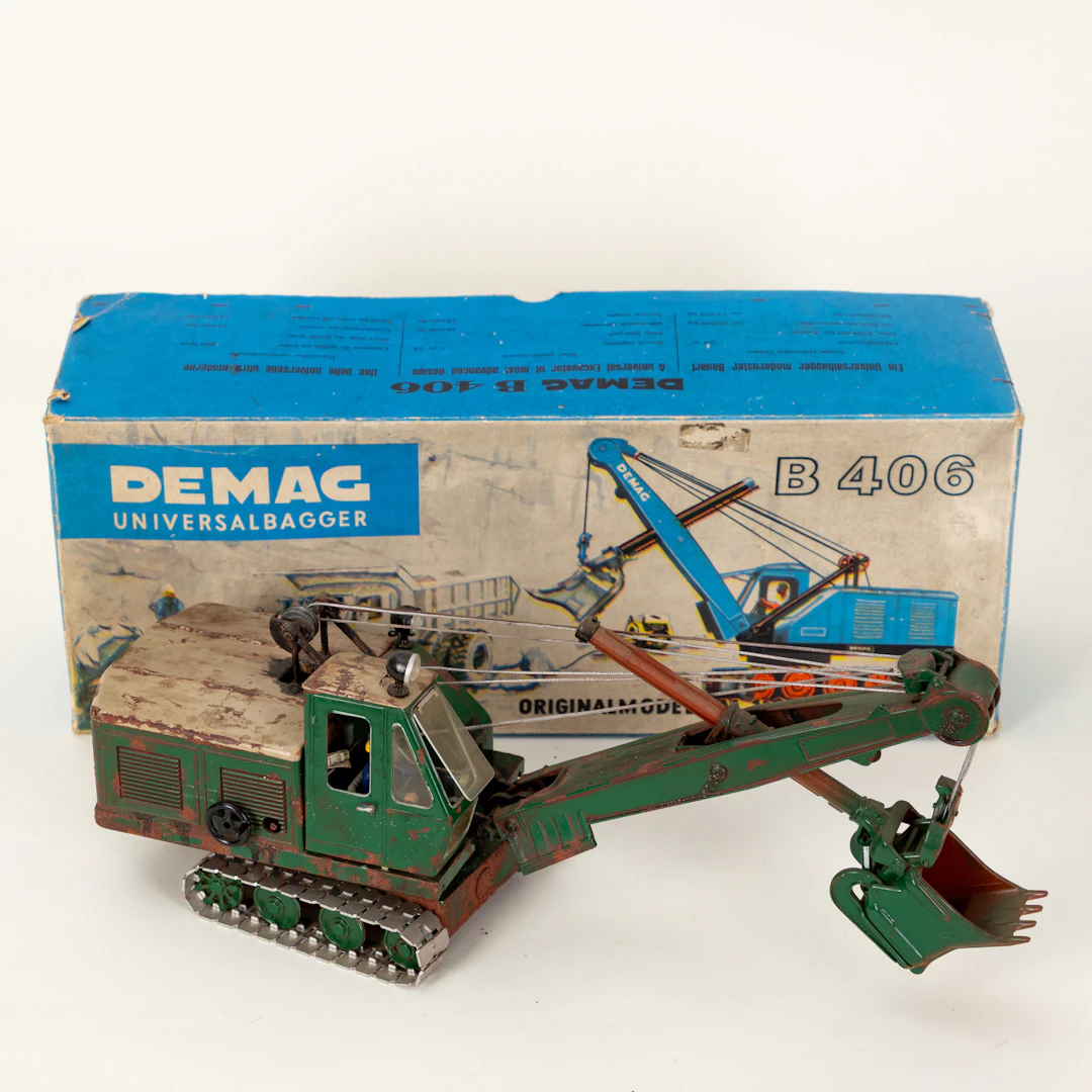 Progresswerk Nürnberg, DEMAG B 406 Hochlöffel-Seilbagger in Originalverpackung.