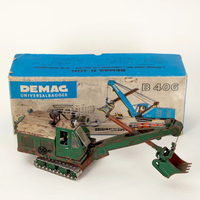 Progresswerk Nürnberg, DEMAG B 406 Hochlöffel-Seilbagger in Originalverpackung.