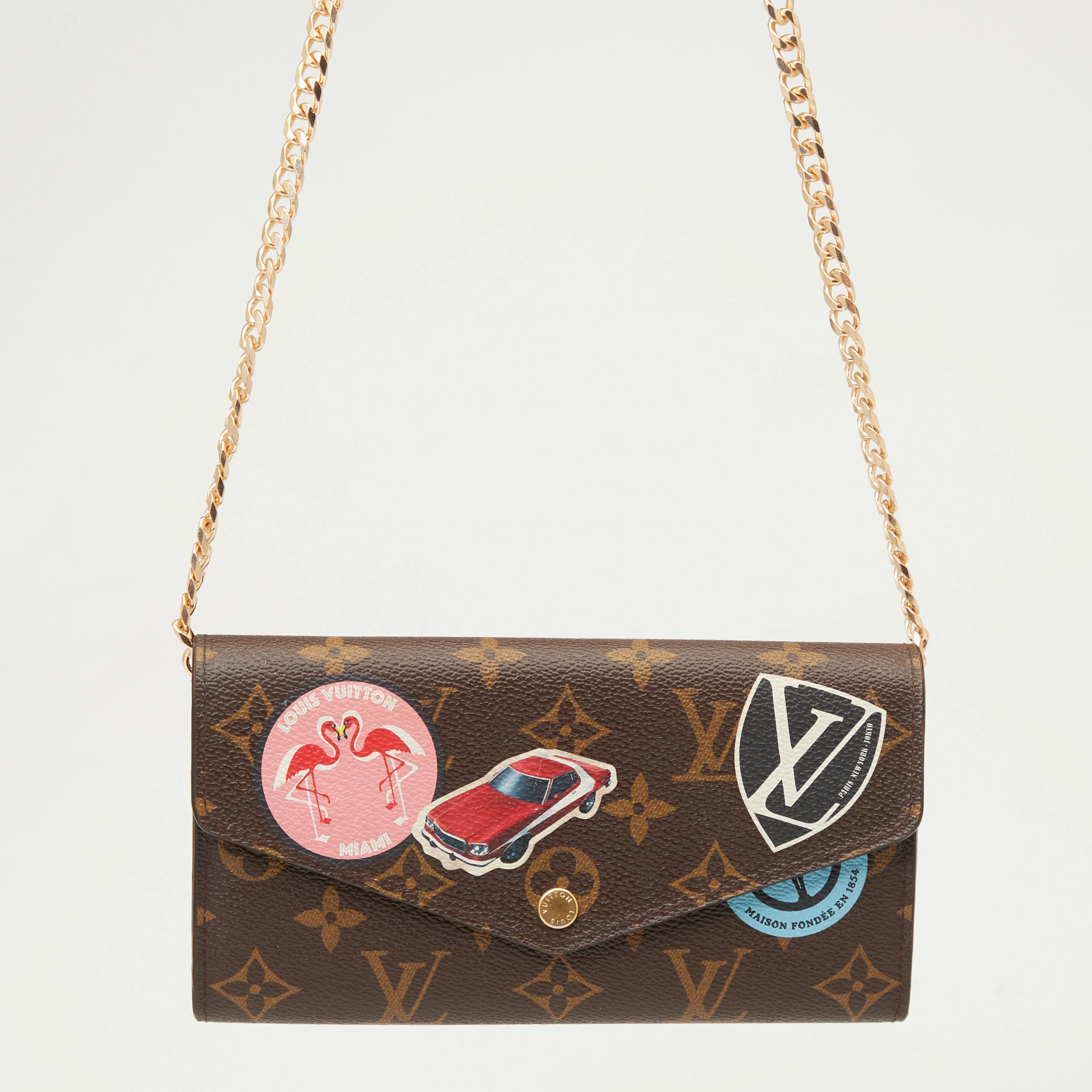 LOUIS VUITTON. Portemonnaie / Tasche, Modell 'Monogram World Tour