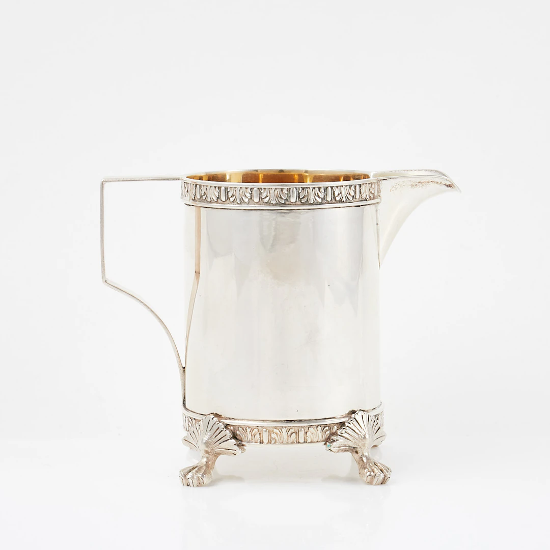 GRÄDDKANNA, silver, med lejontassar, stämplad Norrköping 1905, möjligen