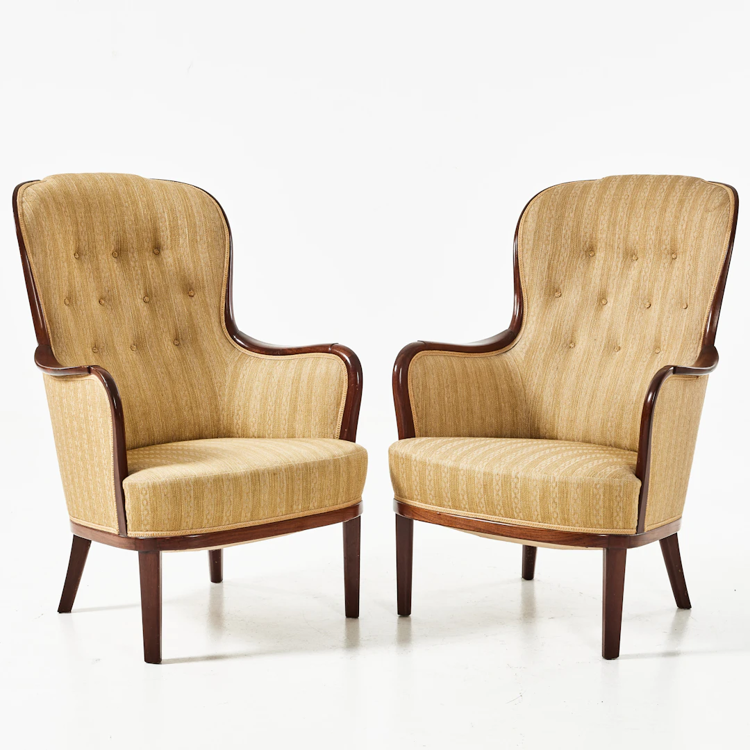 CARL MALMSTEN. Fåtöljer, 1 par, “Advokaten", mahogny, brännmärkt CM.