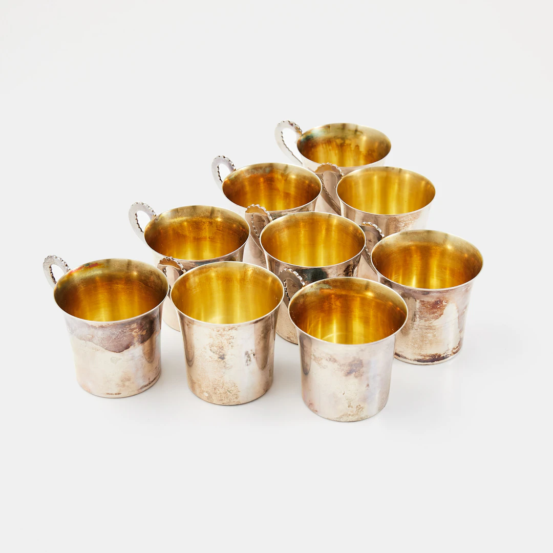 PUNCHMUGGAR, 9 st, silver, invändigt förgyllda, CG Hallberg, Stockholm, 1935.