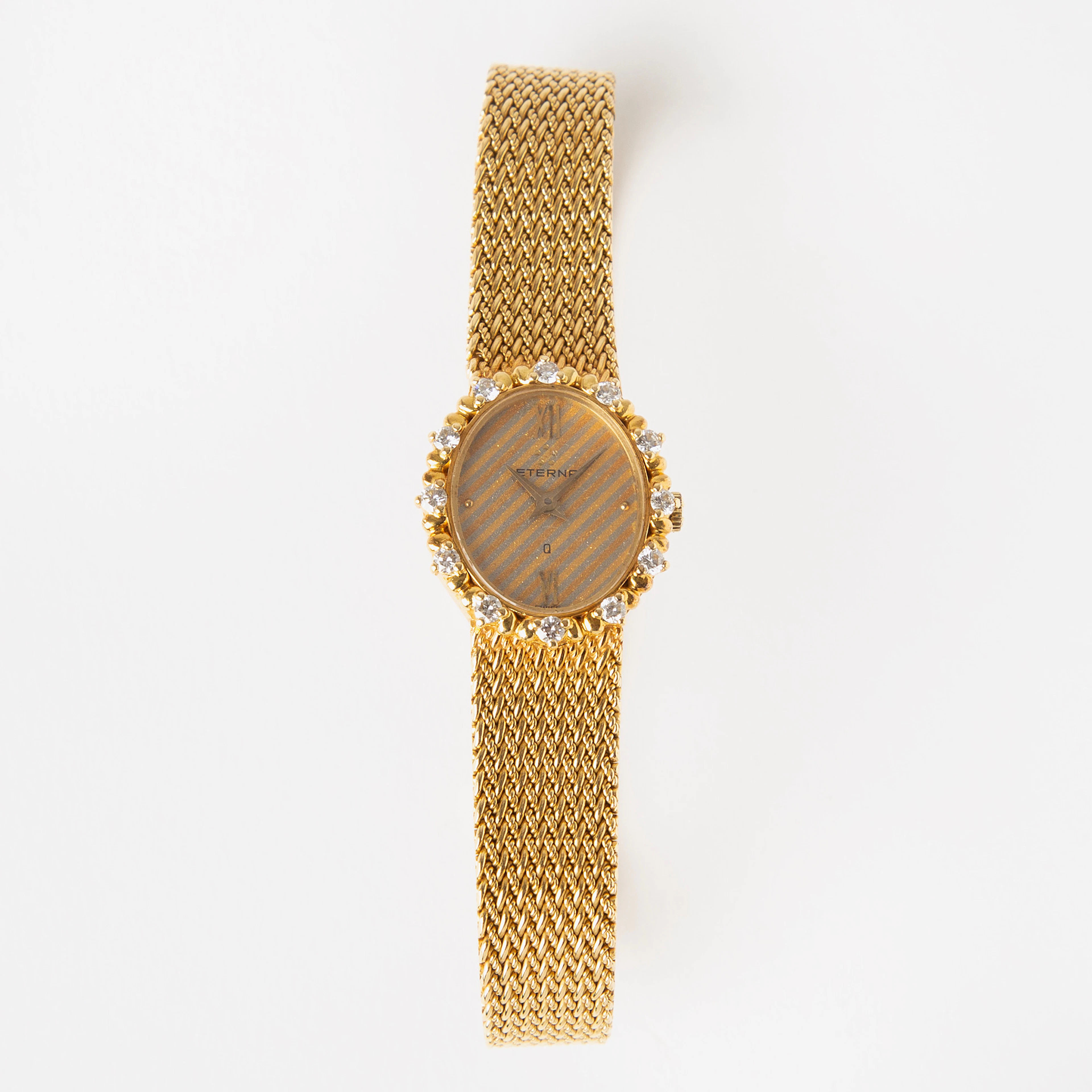 ETERNA, smyckesur, 22 x 19 mm, 18K guld med briljanter, 1970-tal.