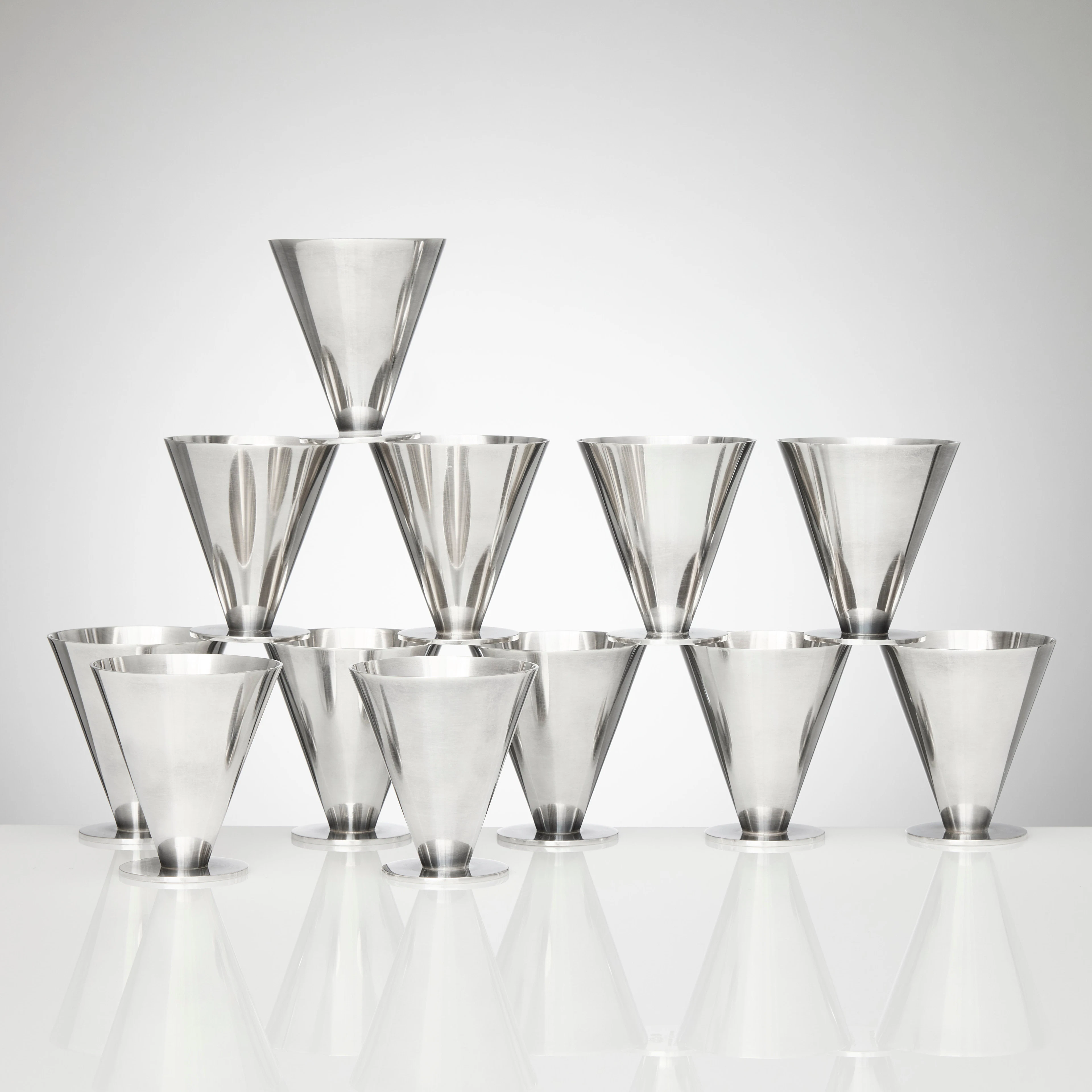 WIWEN NILSSON. Bägare på fot, 12 stycken, sterlingsilver, Lund 1935-1974.