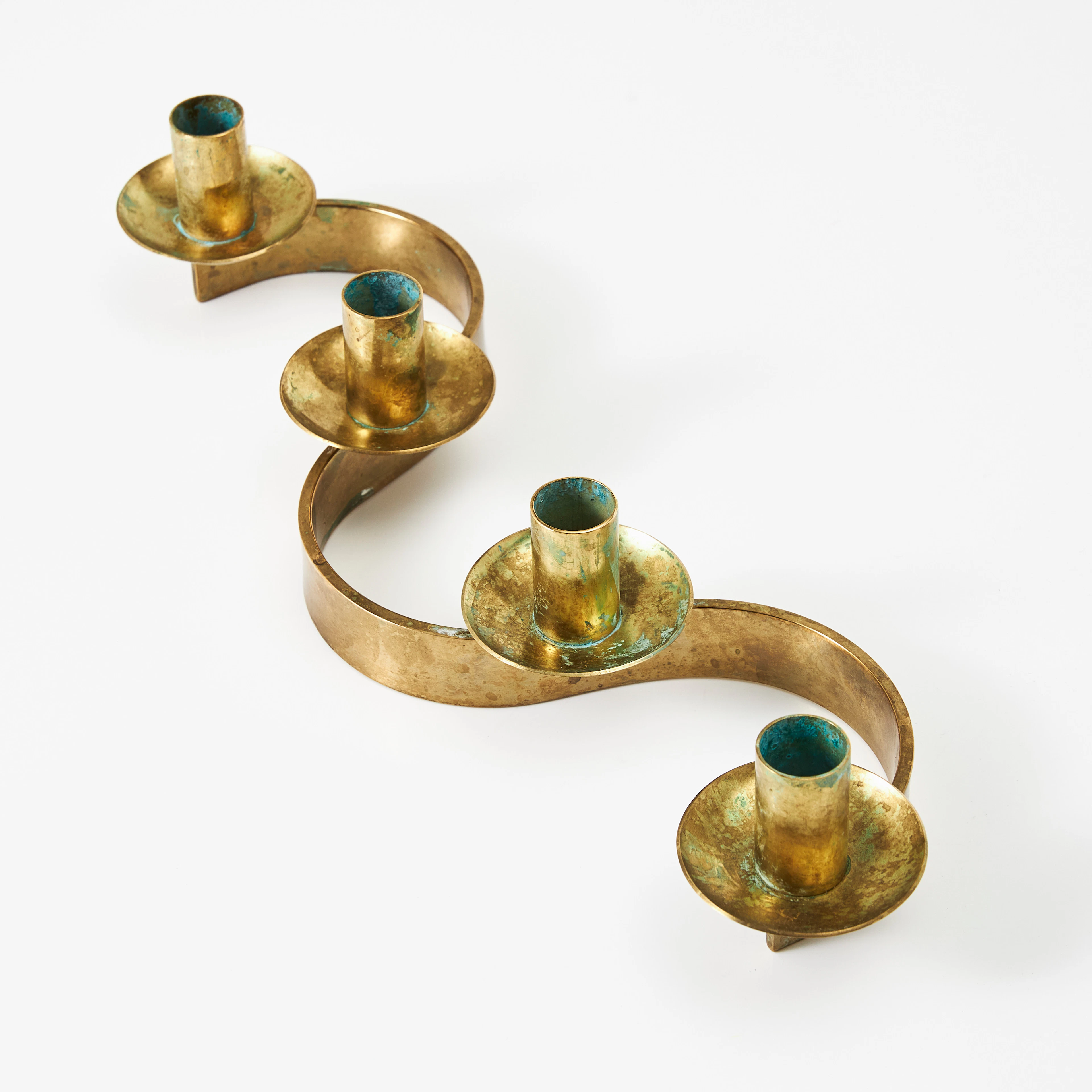 JOSEF FRANK. "Slingan", ljusstake, Firma Svenskt Tenn, mässing, formgivningsår