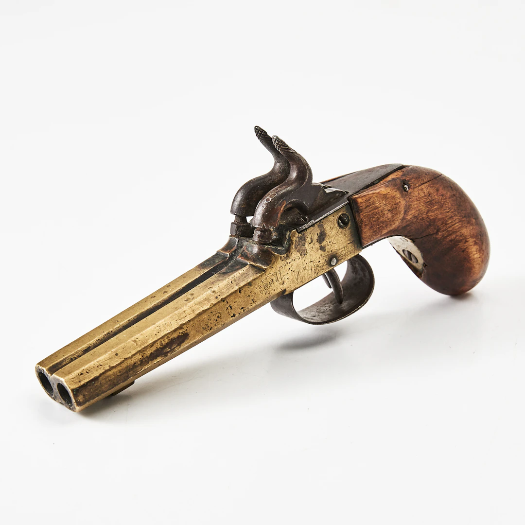 SLAGLÅSPISTOL, dubbelpipig, mässing, 1800-tal, omärkt.