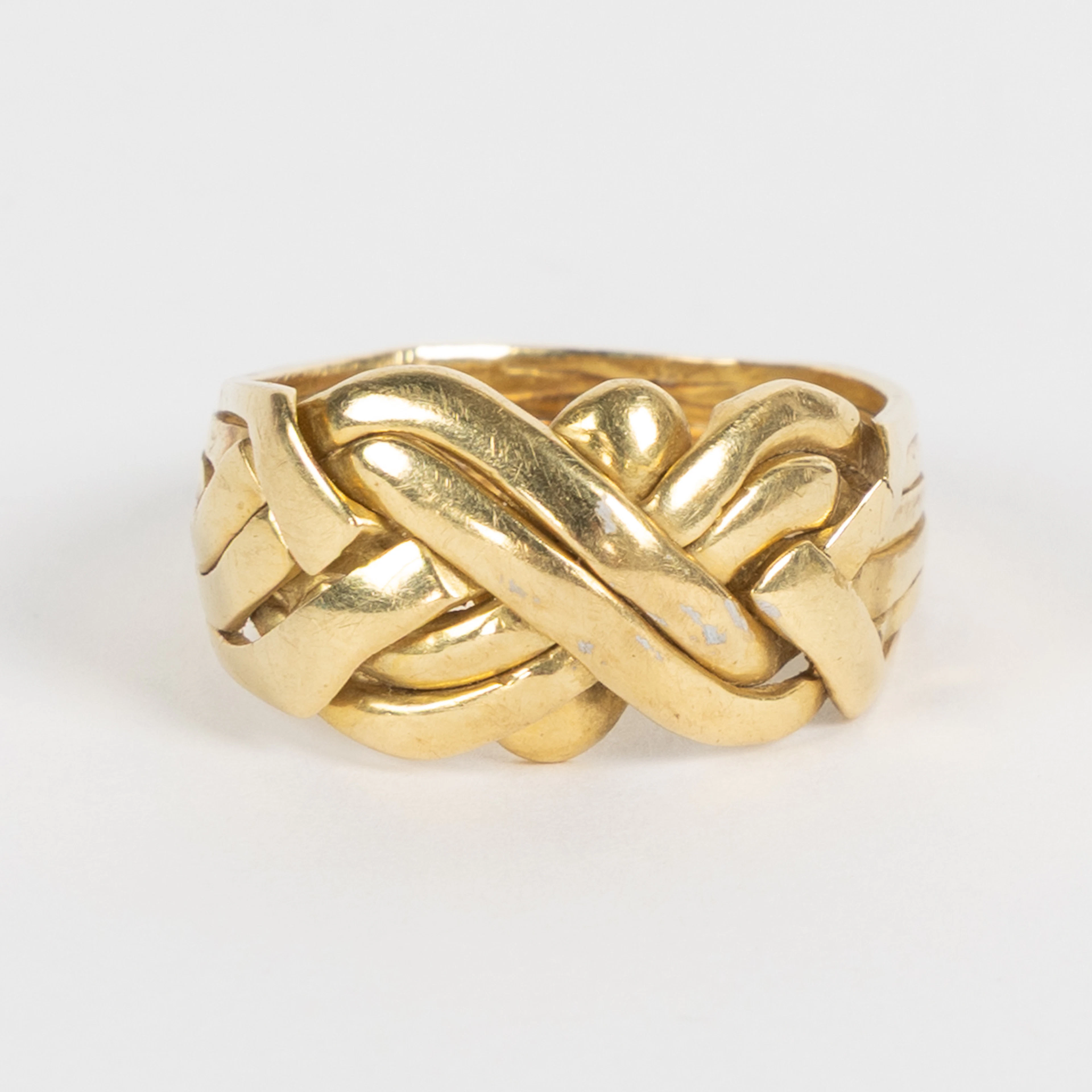 PUSSELRING, 6 delad, 18K guld.