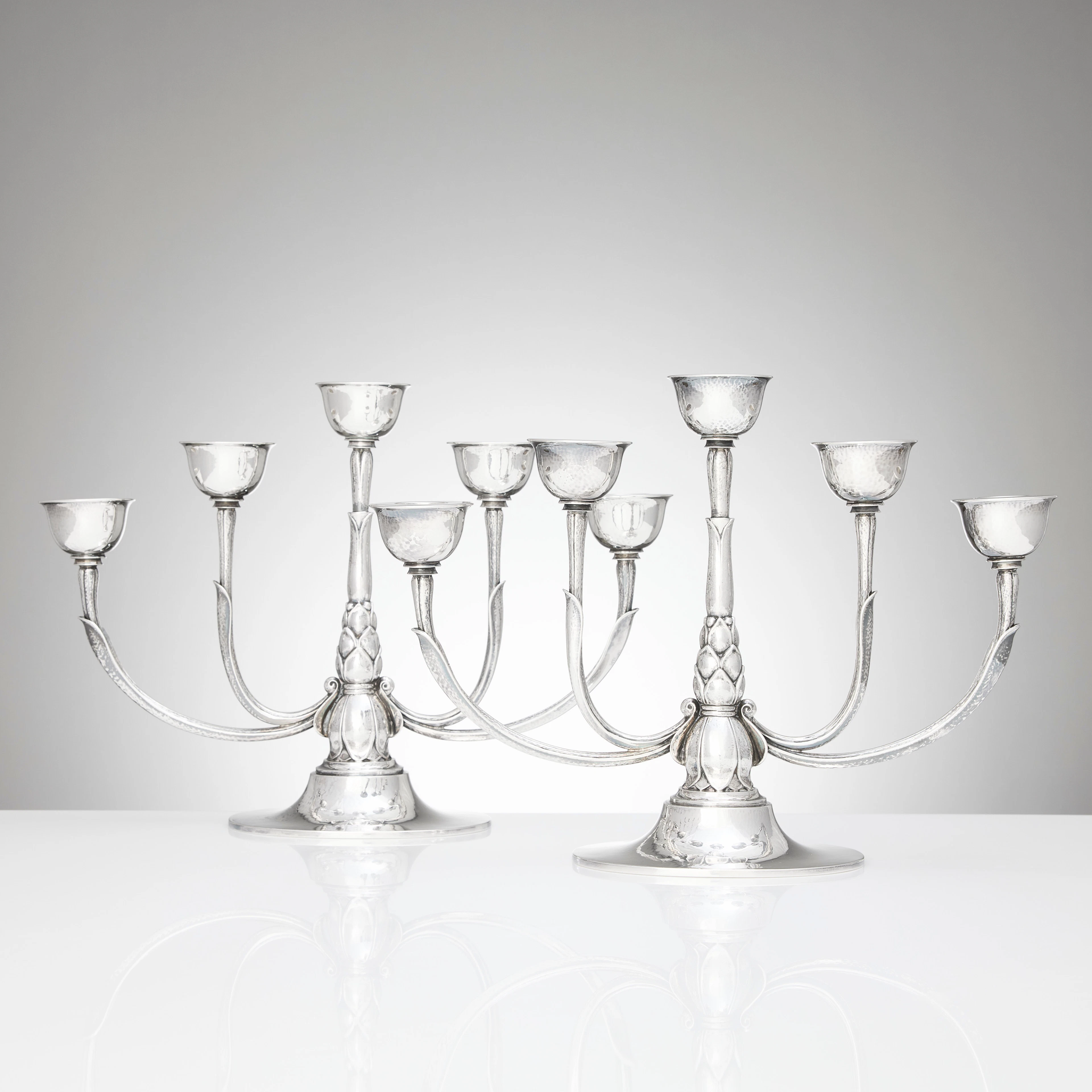 HARALD NIELSEN. Kandelabrar för fem ljus, ett par, sterlingsilver