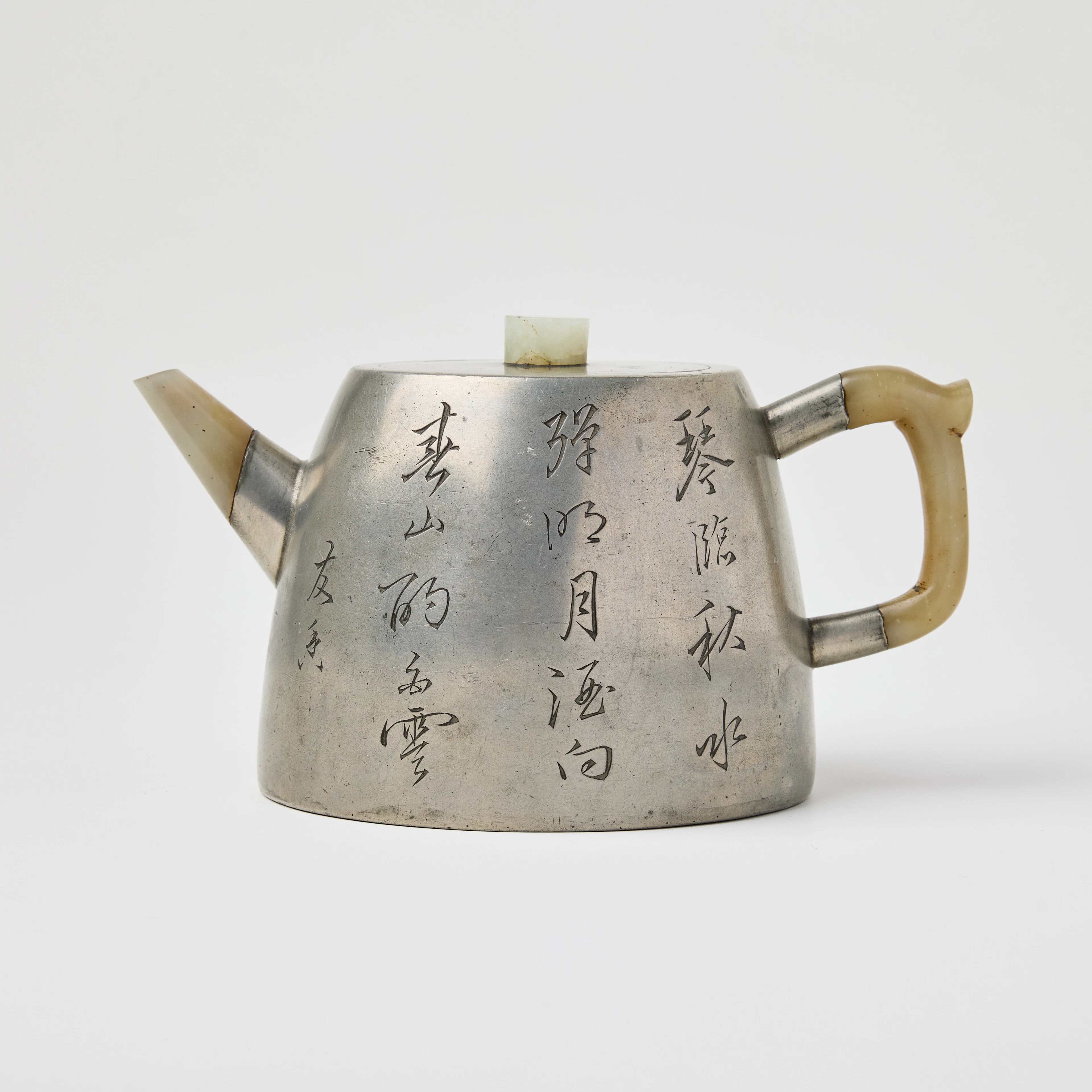 A Chinese Pewter and Yixing Stoneware Teapot and Cover.
