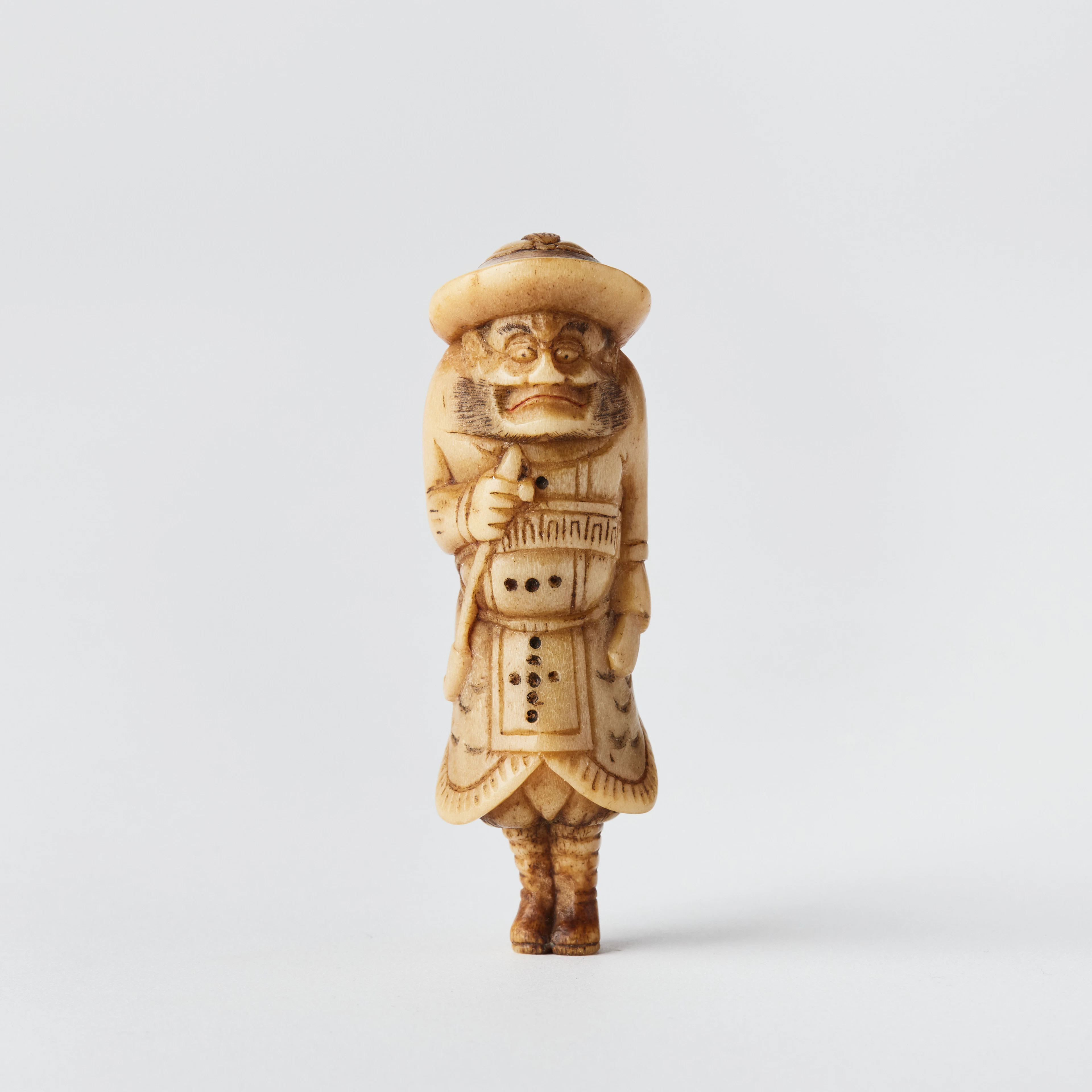 A Japanese Antler Netsuke of a Dutchman.