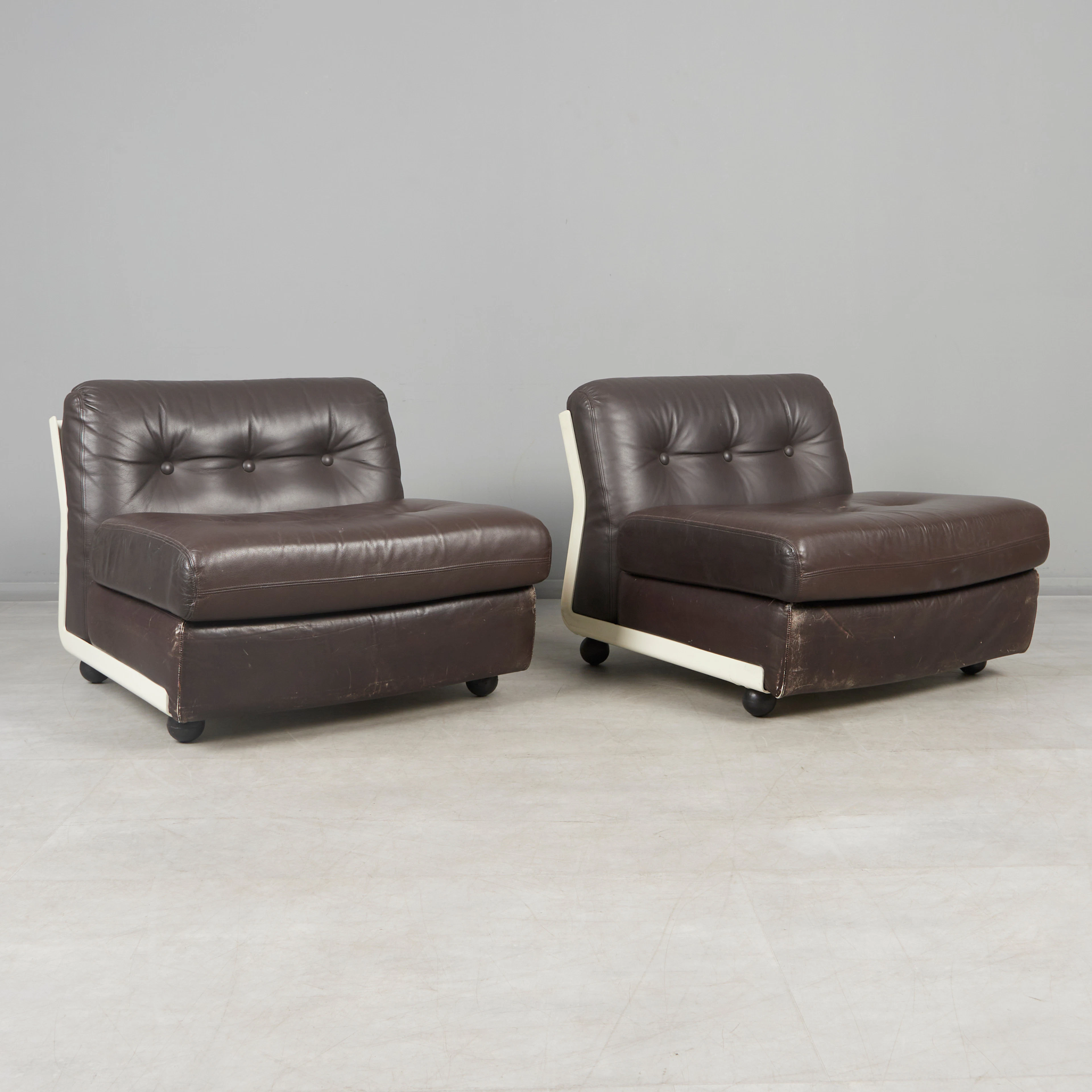 MARIO BELLINI. C&B Italia, Paar Sessel, Modell 'Amanta', Leder, Fiberglas