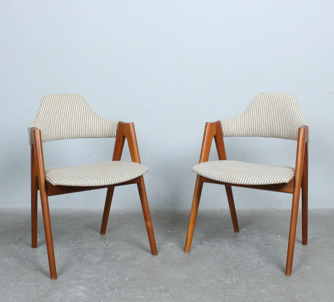 KAI KRISTIANSEN. Paar Armlehnstühle, Modell "Compass", Teak, Dänemark, 1960er.