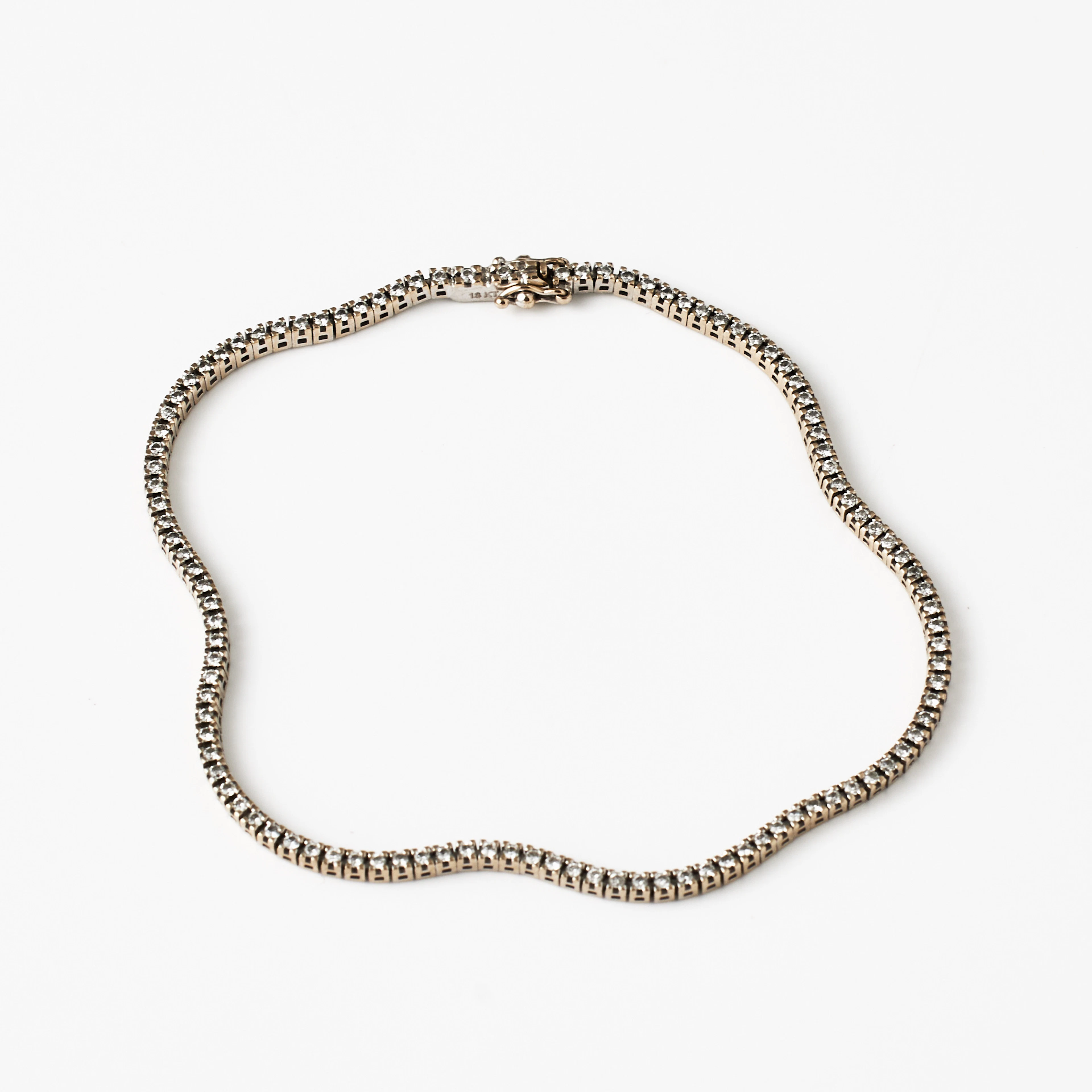 ARMBAND, 18 k rodierat vitguld, s.k. rivière, briljanter totalt 0,94
