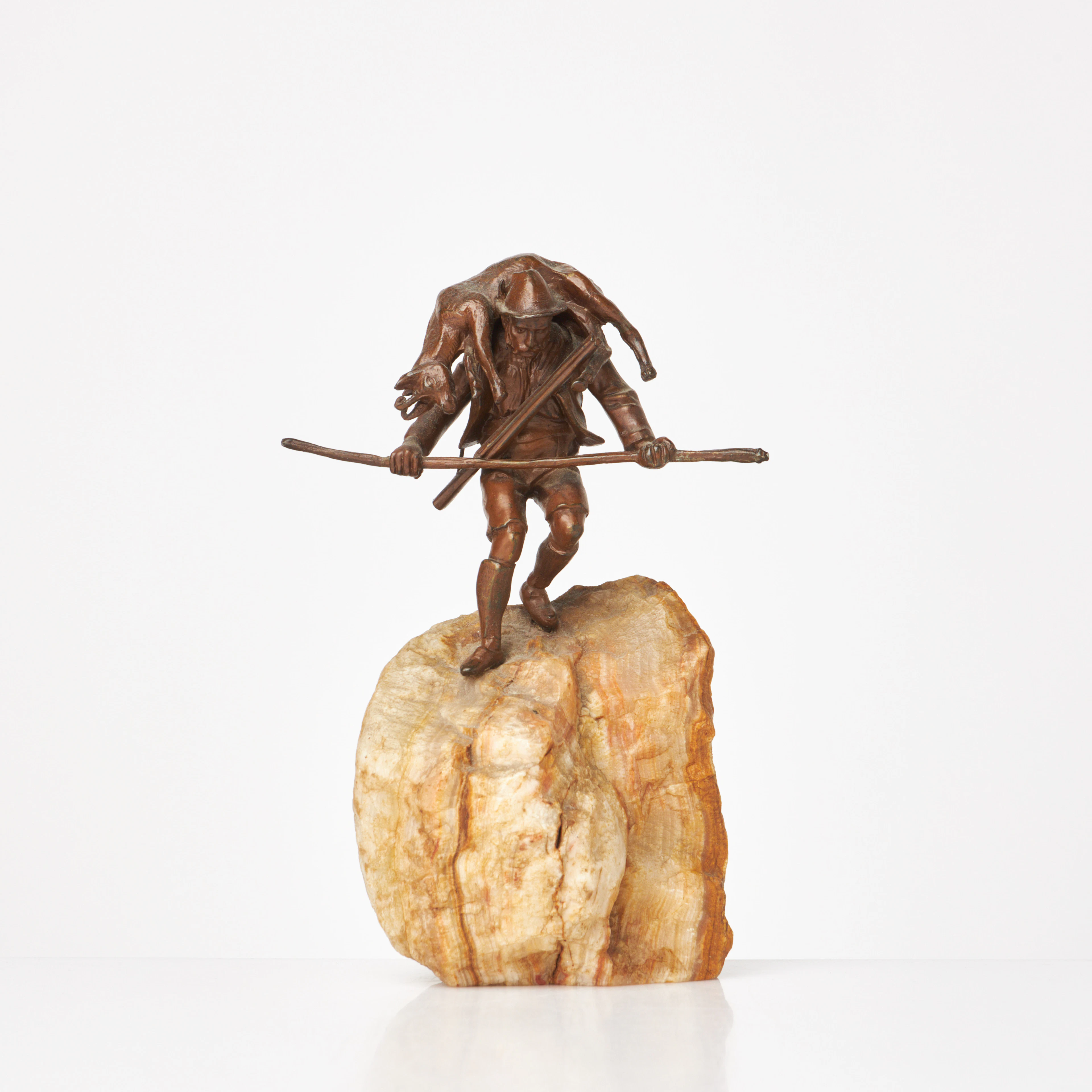 SKULPTUR, man som bär get, 1900-talets första hälft, patinerad brons