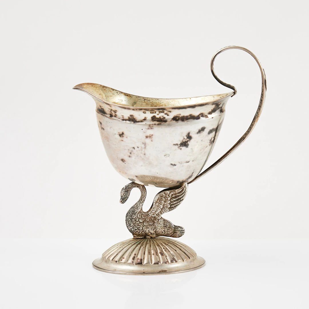 PEHR BLOMMERT verksam 1810-1821 (1833), gräddkanna på fot i form av