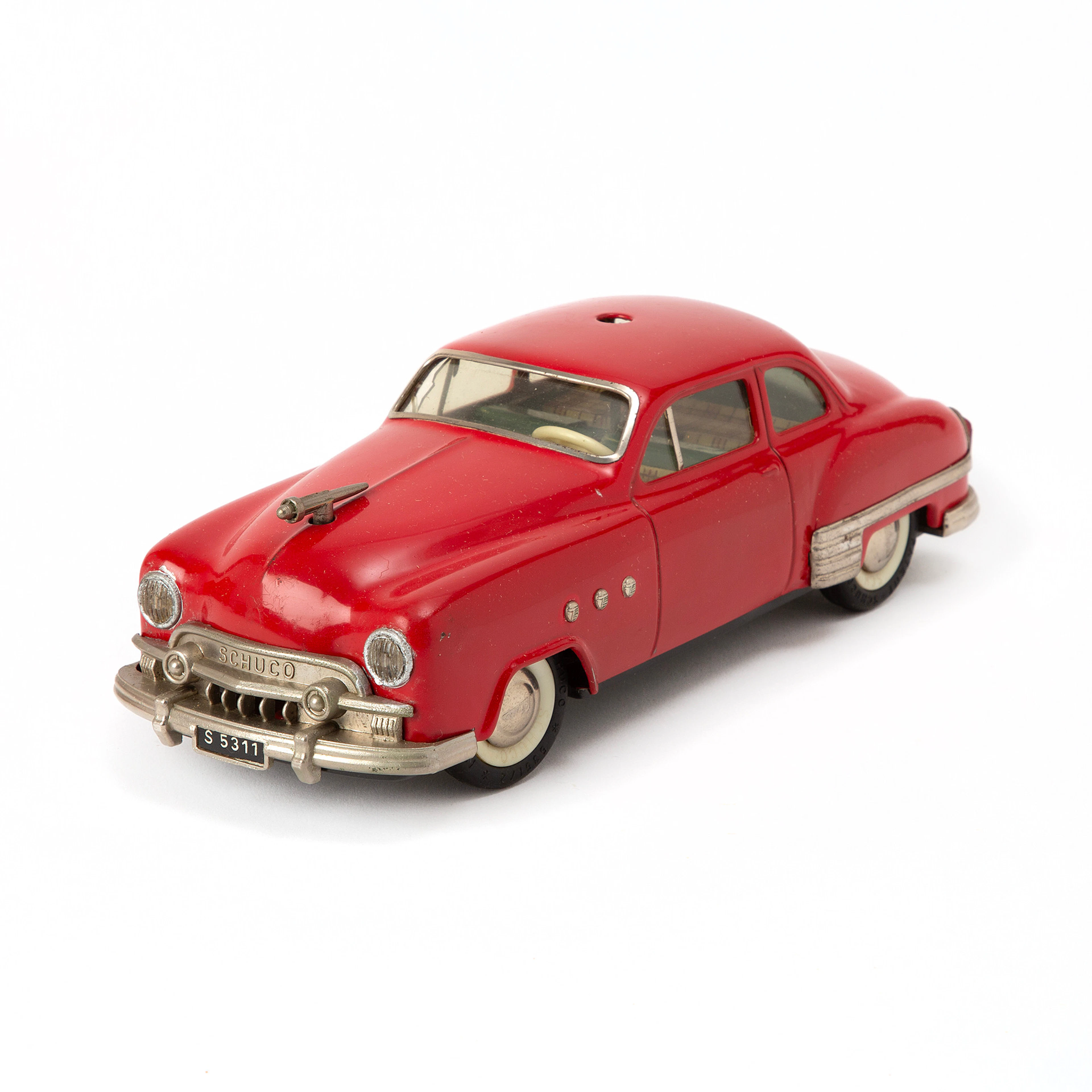 SCHUCO. "Federmotor-Ingenico 5300", leksaksbil med tillbehör, plåt