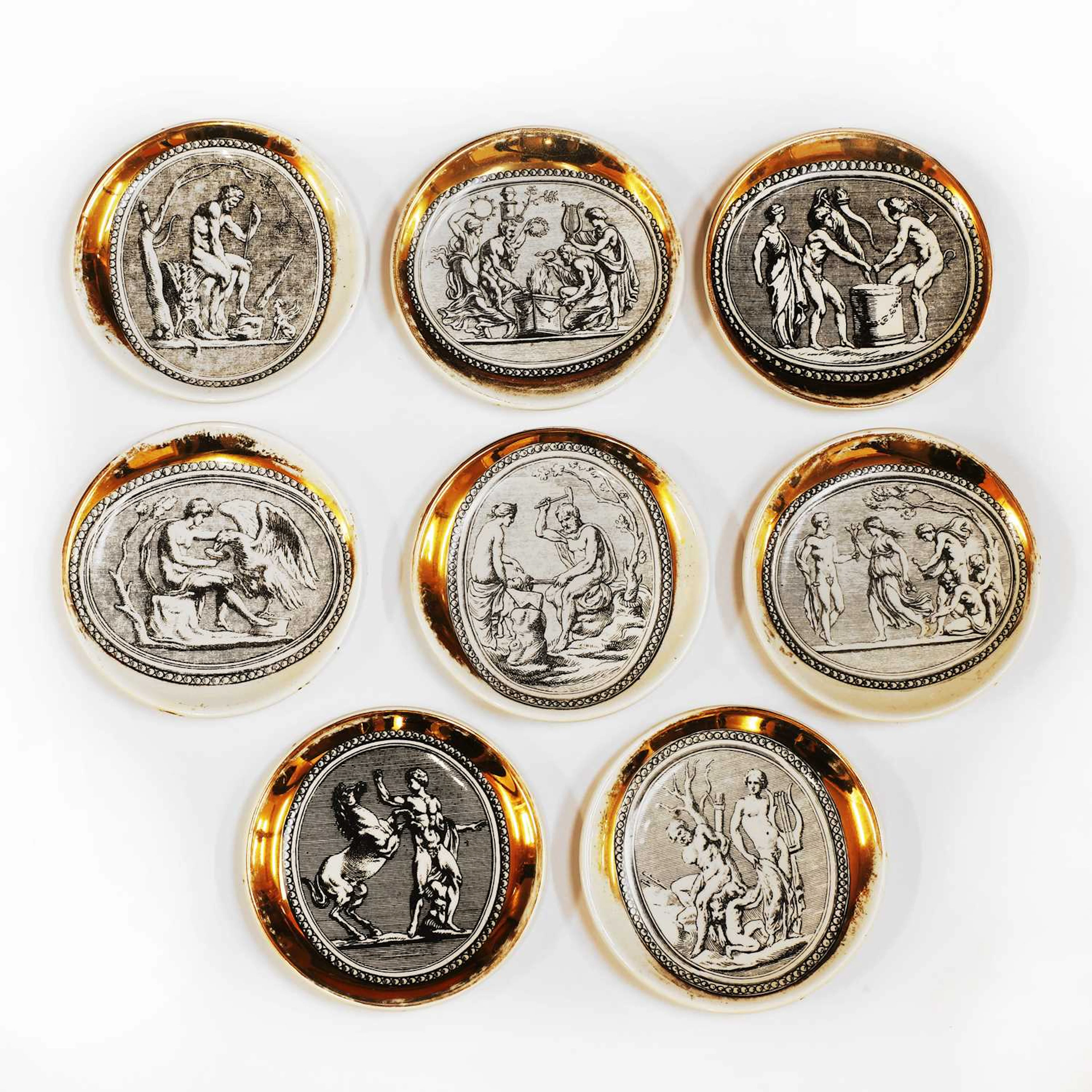 Piero Fornasetti (Italian, 1913-1988) a group of eight 'Cammei' coasters