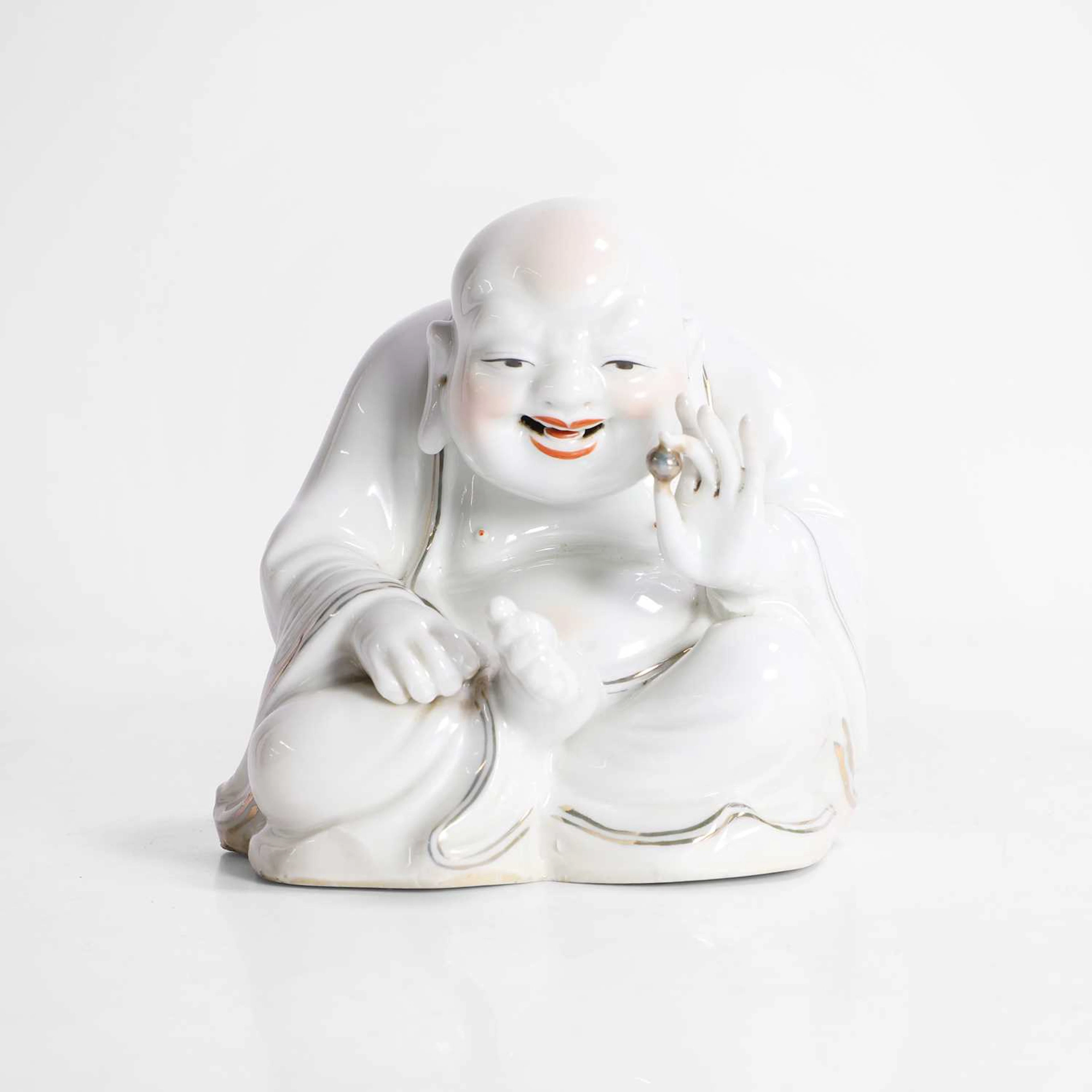 A Chinese porcelain budai