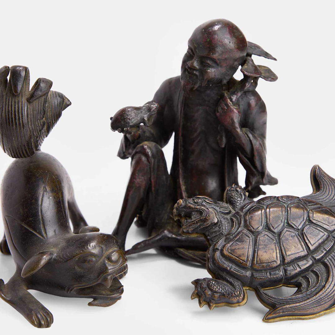 Three Japanese bronze okimono 19th-20th century