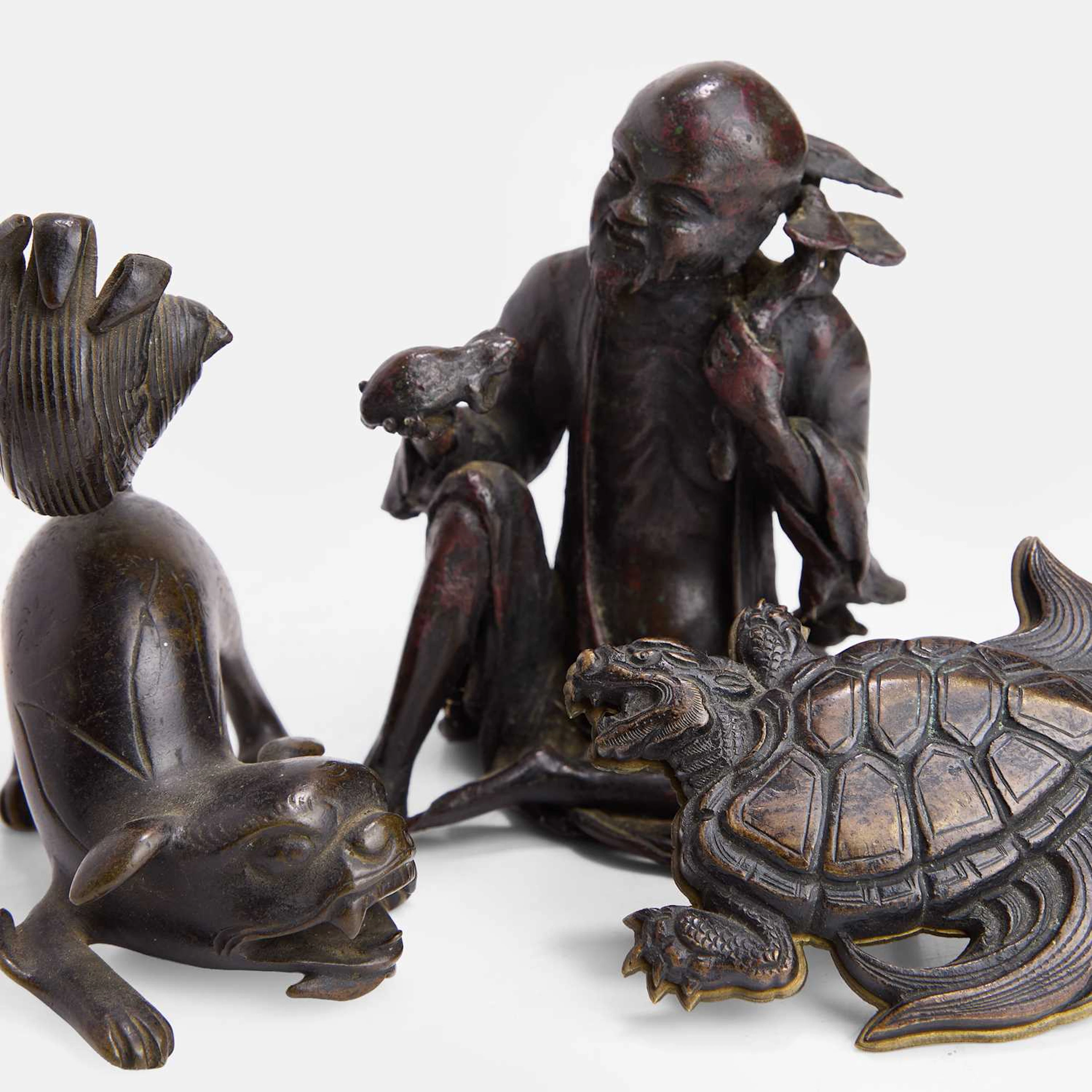 Three Japanese bronze okimono 19th-20th century