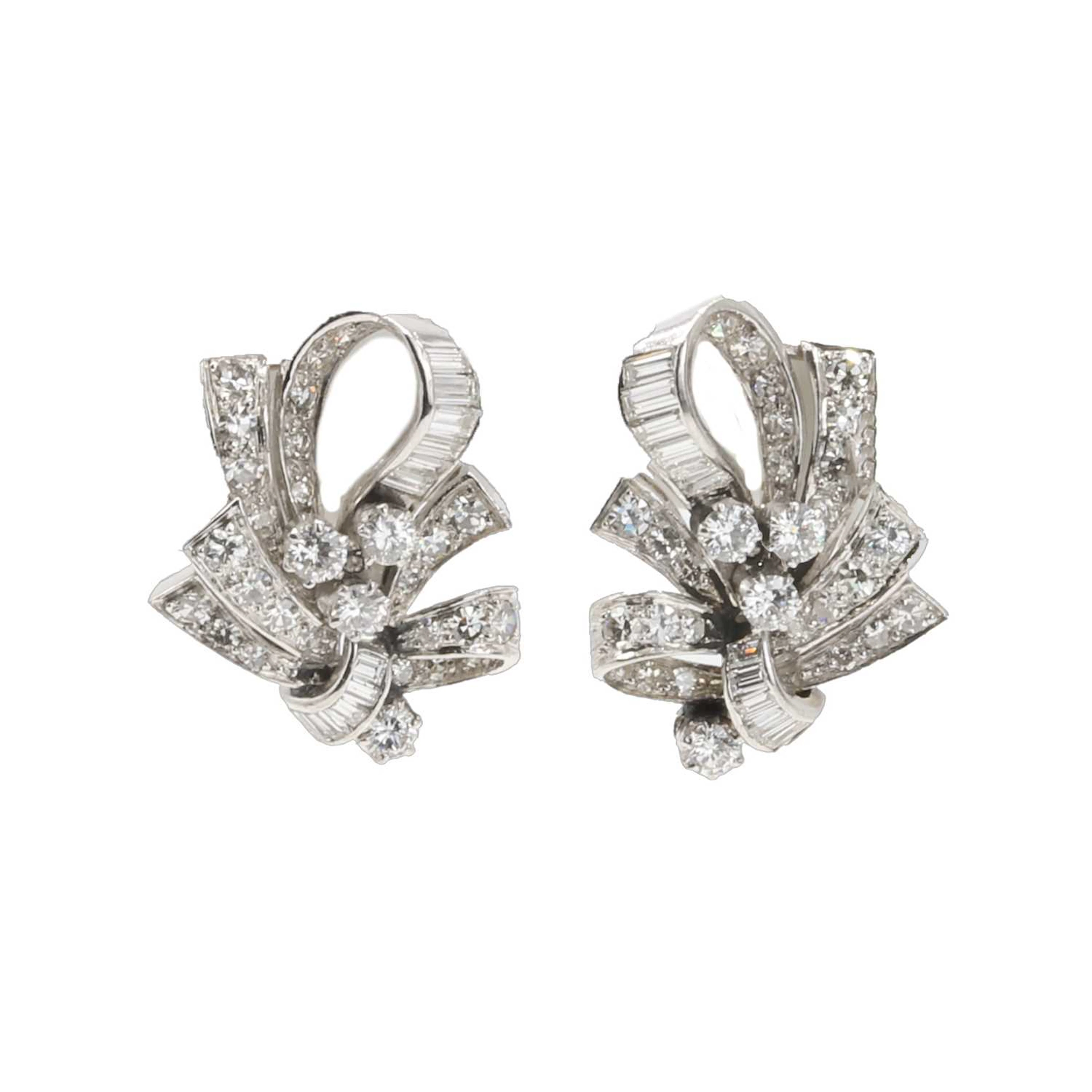 A pair of diamond clip-on earrings, c.1950