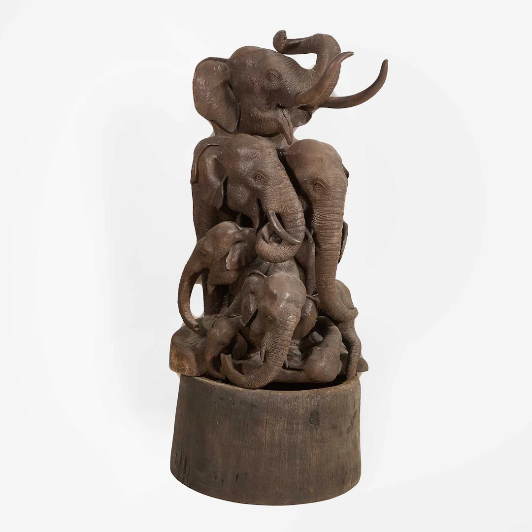 Thai School, 20th century a large carved wood model of elephants