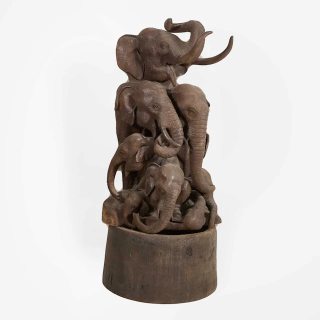 Thai School, 20th century a large carved wood model of elephants
