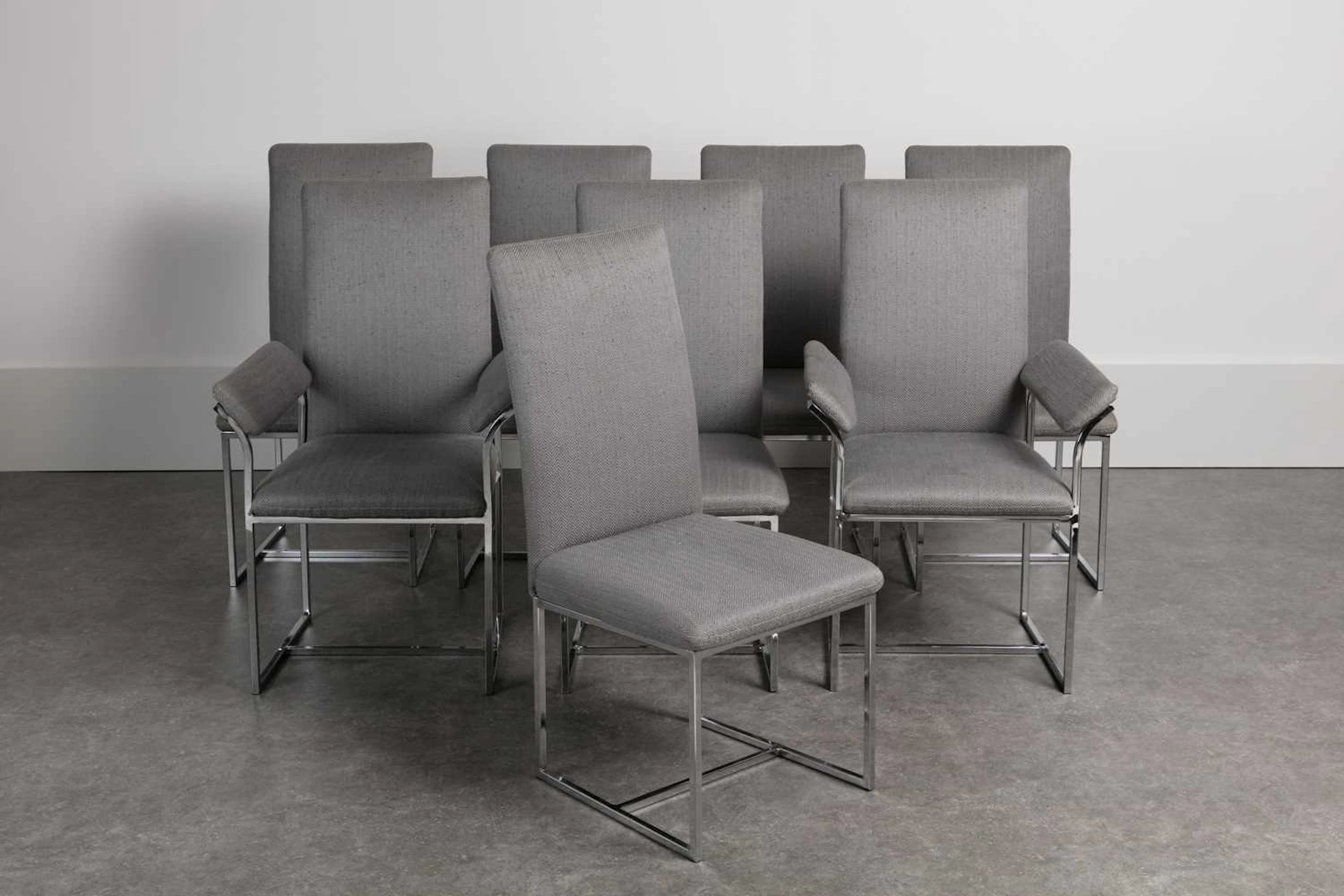 A set of eight steel high-back dining chairs