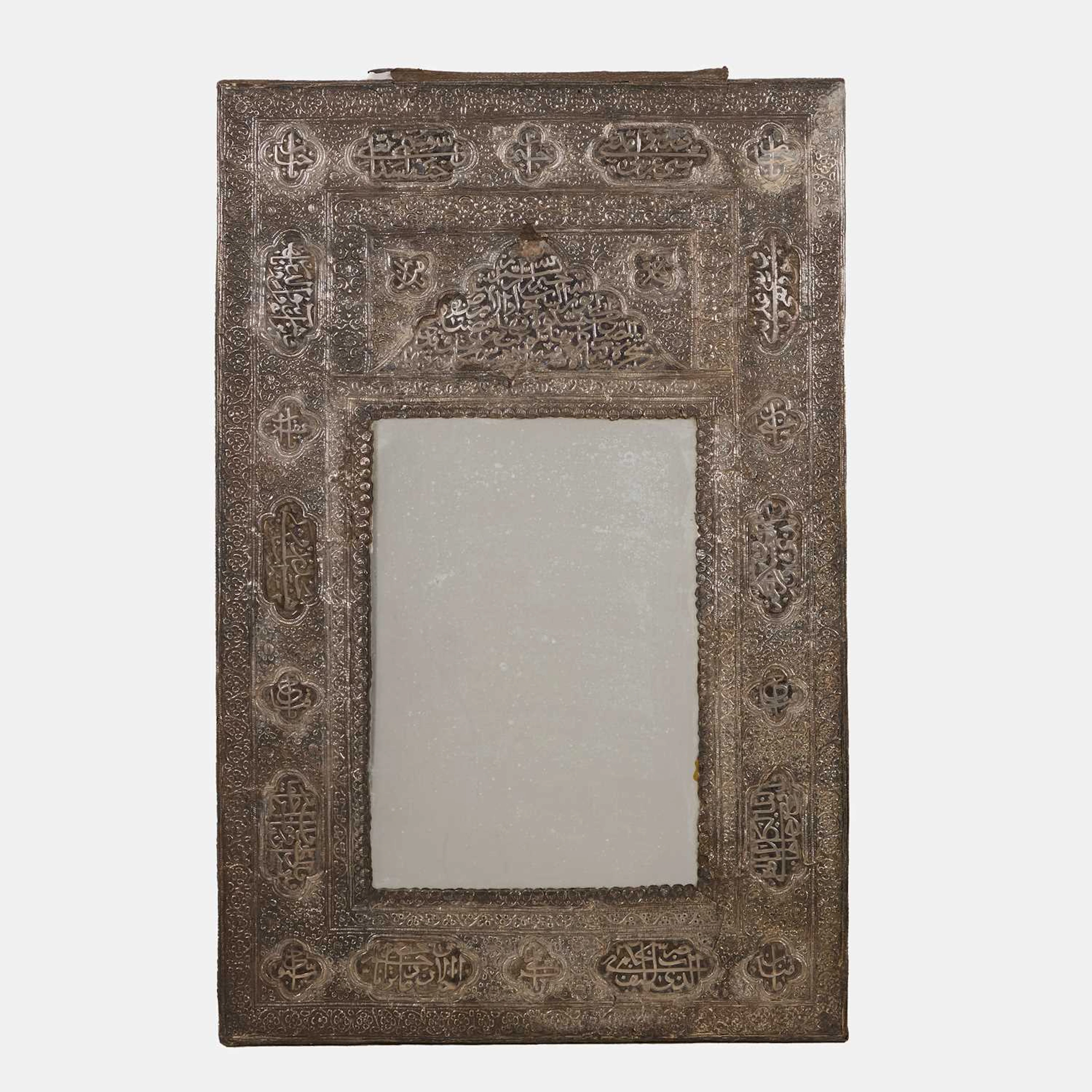 A Qajar white metal wall mirror late 19th century/early 20th century, Iran