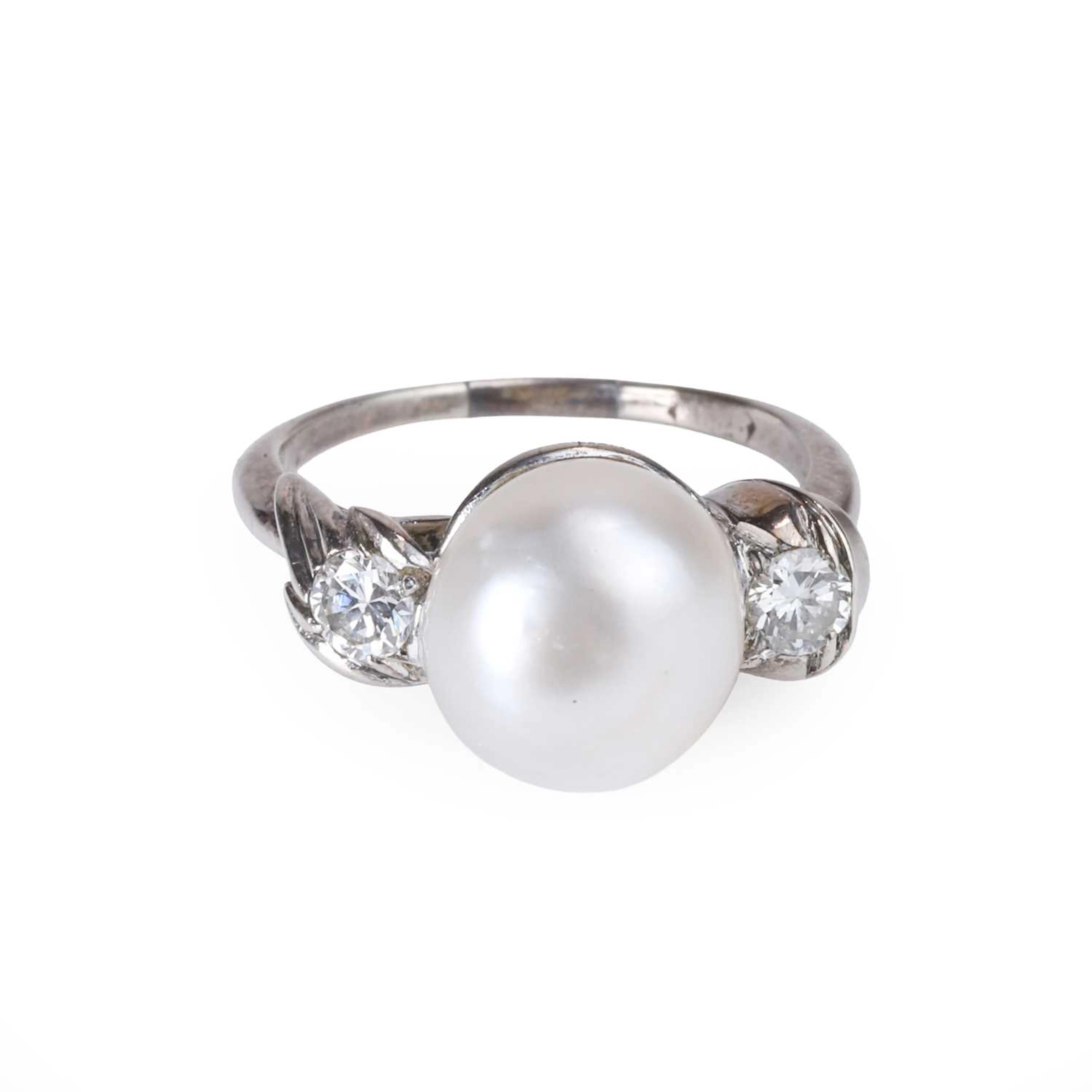 A natural saltwater pearl and diamond ring