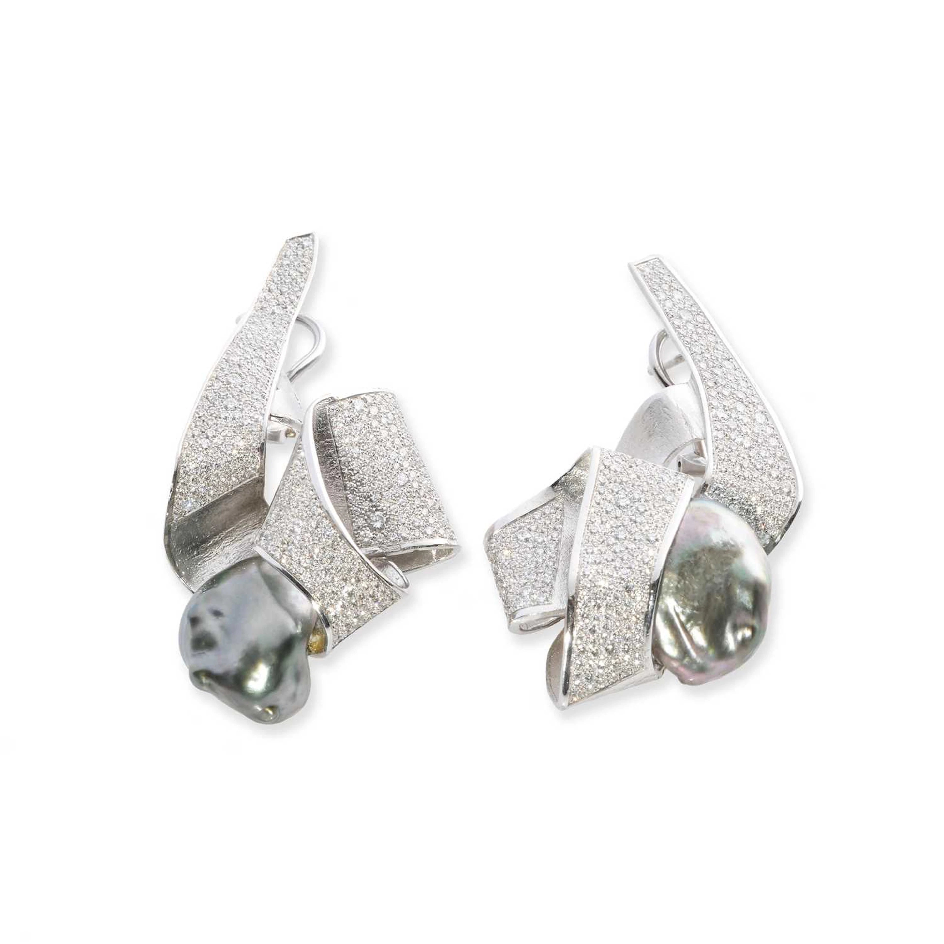 Ken Bolan and Marinette Domon: a pair of diamond and Tahitian pearl