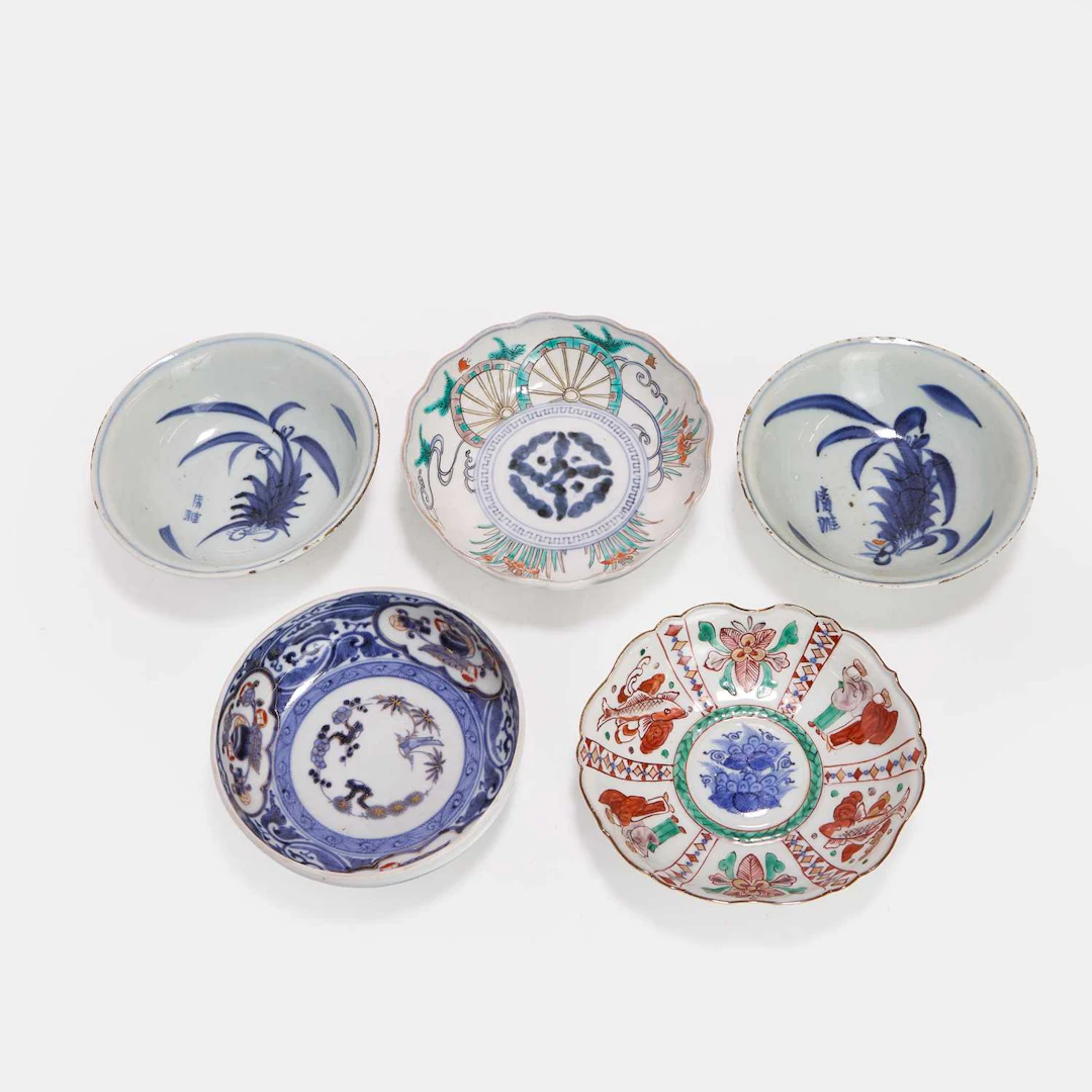 A collection of five Japanese porcelain saucers 18th-19th century