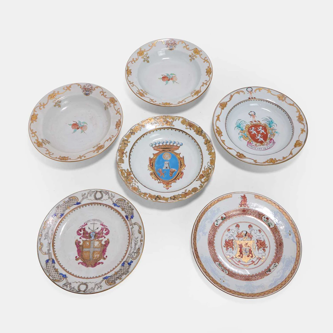 A collection of Chinese export famille rose armorial plates 18th century