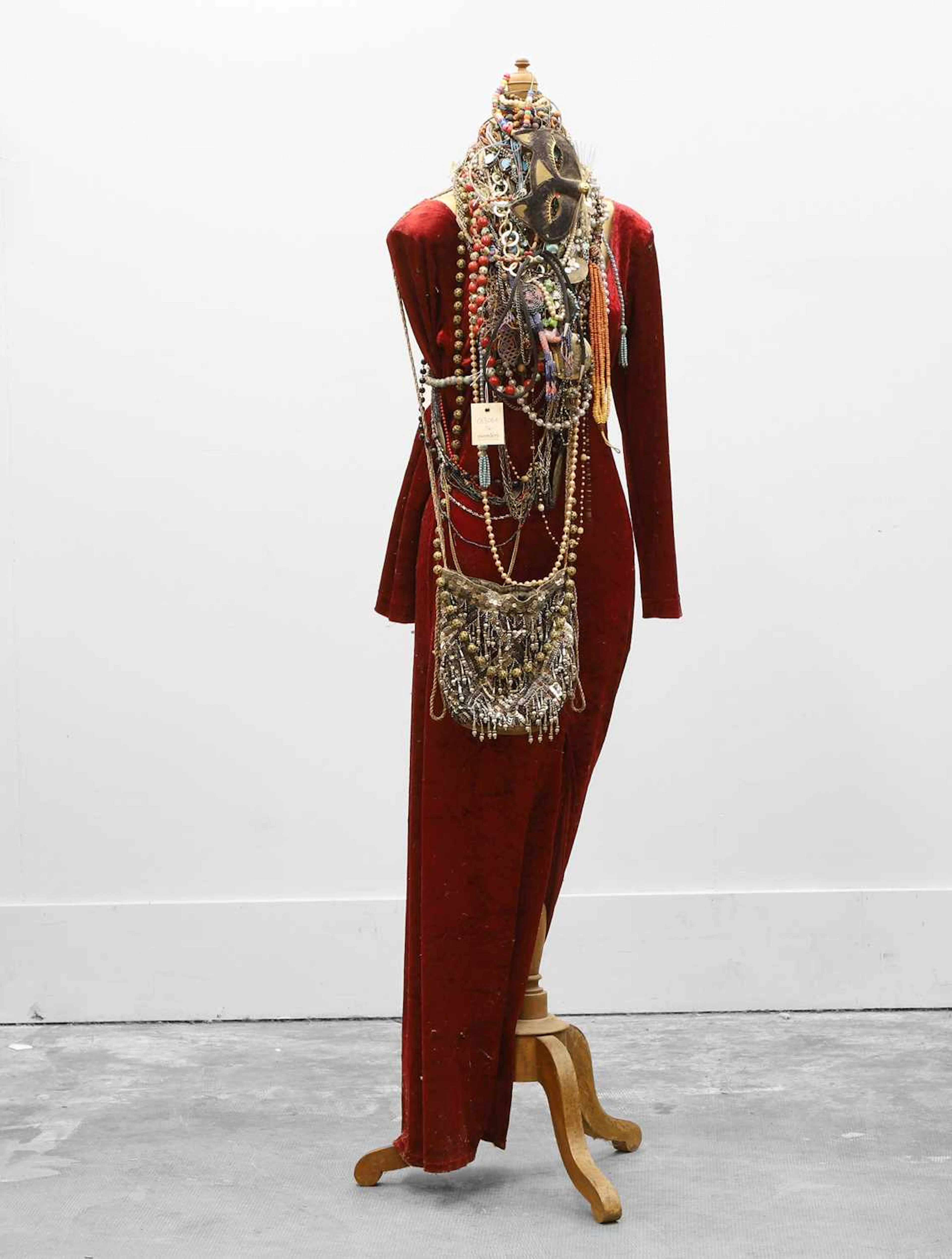 A vintage mannequin displaying a collection of costume jewellery 20th