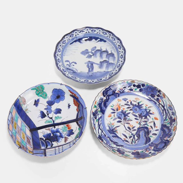 A collection of three Japanese blue and white plates 19th century