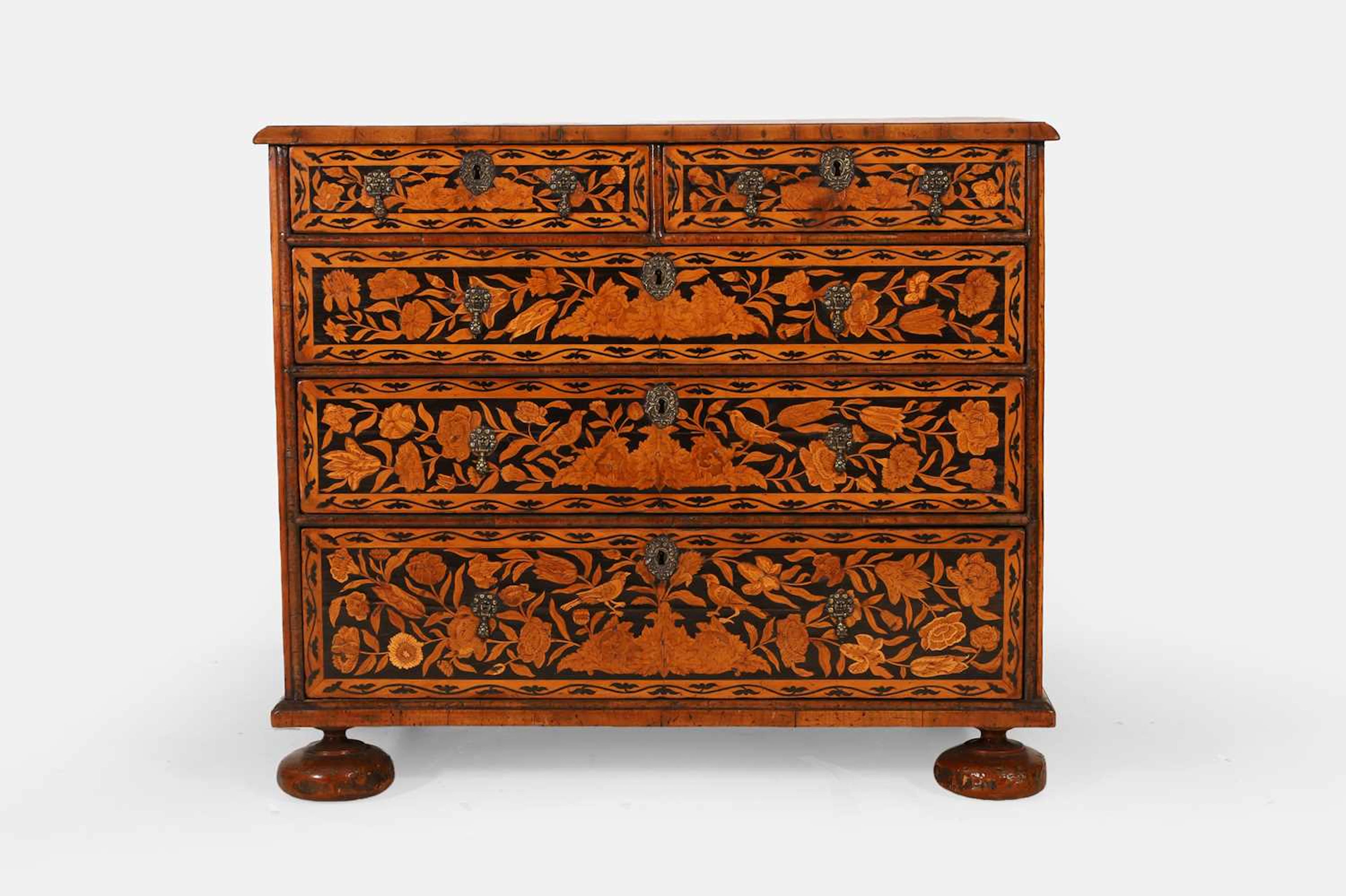 A William and Mary walnut and marquetry chest of drawers circa 1690